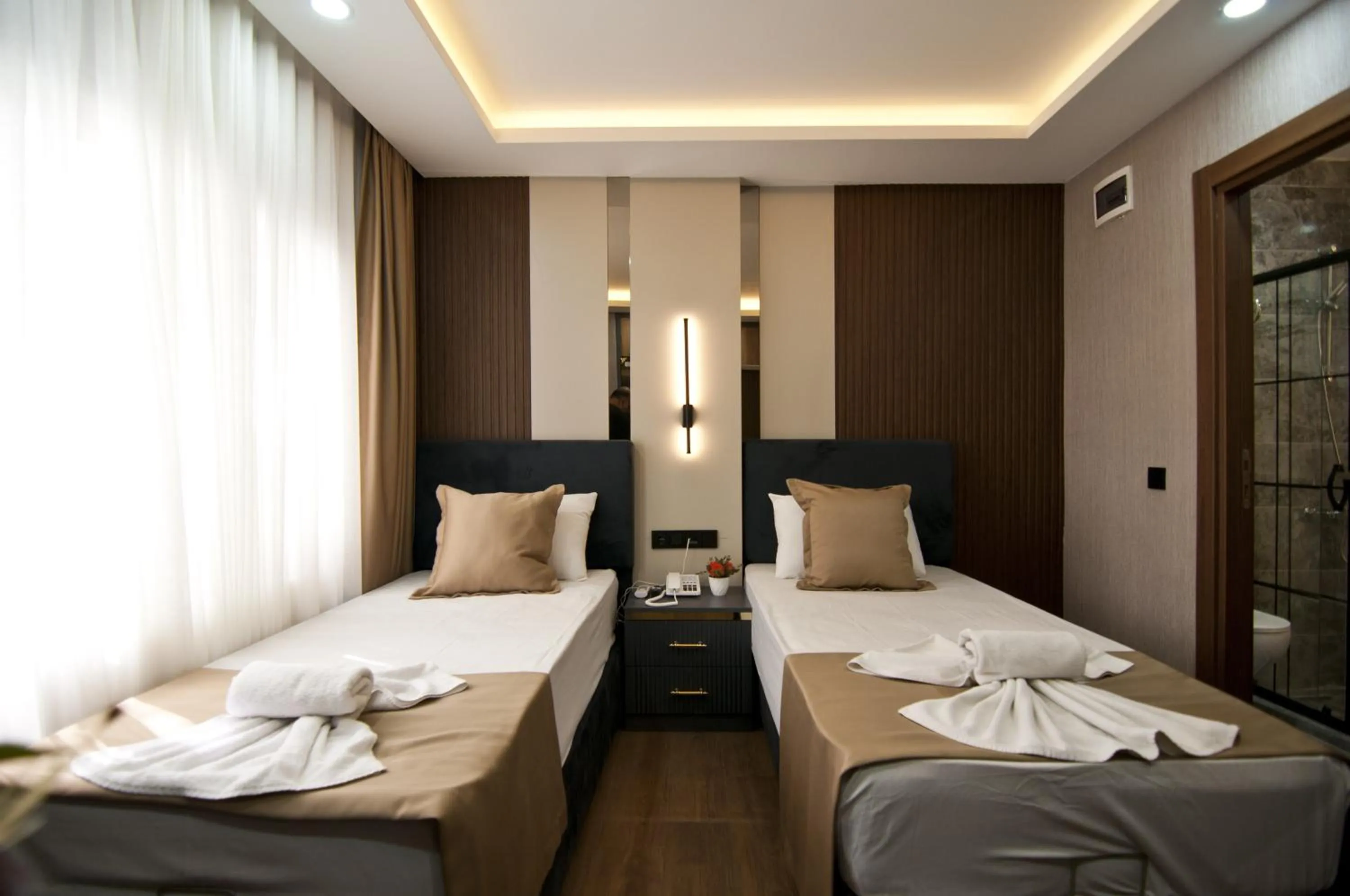 Photo of the whole room, Bed in Grand Bagoz Hotel