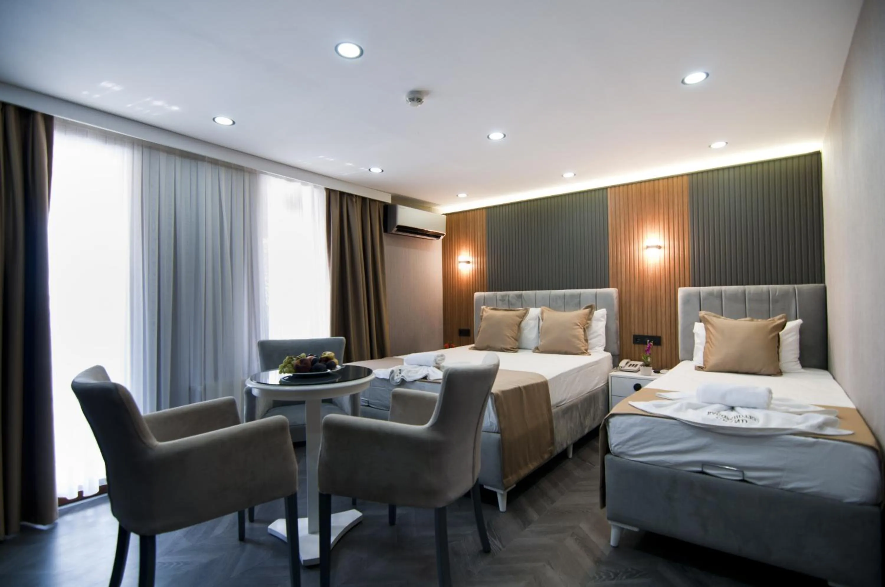 Photo of the whole room, Bed in Grand Bagoz Hotel