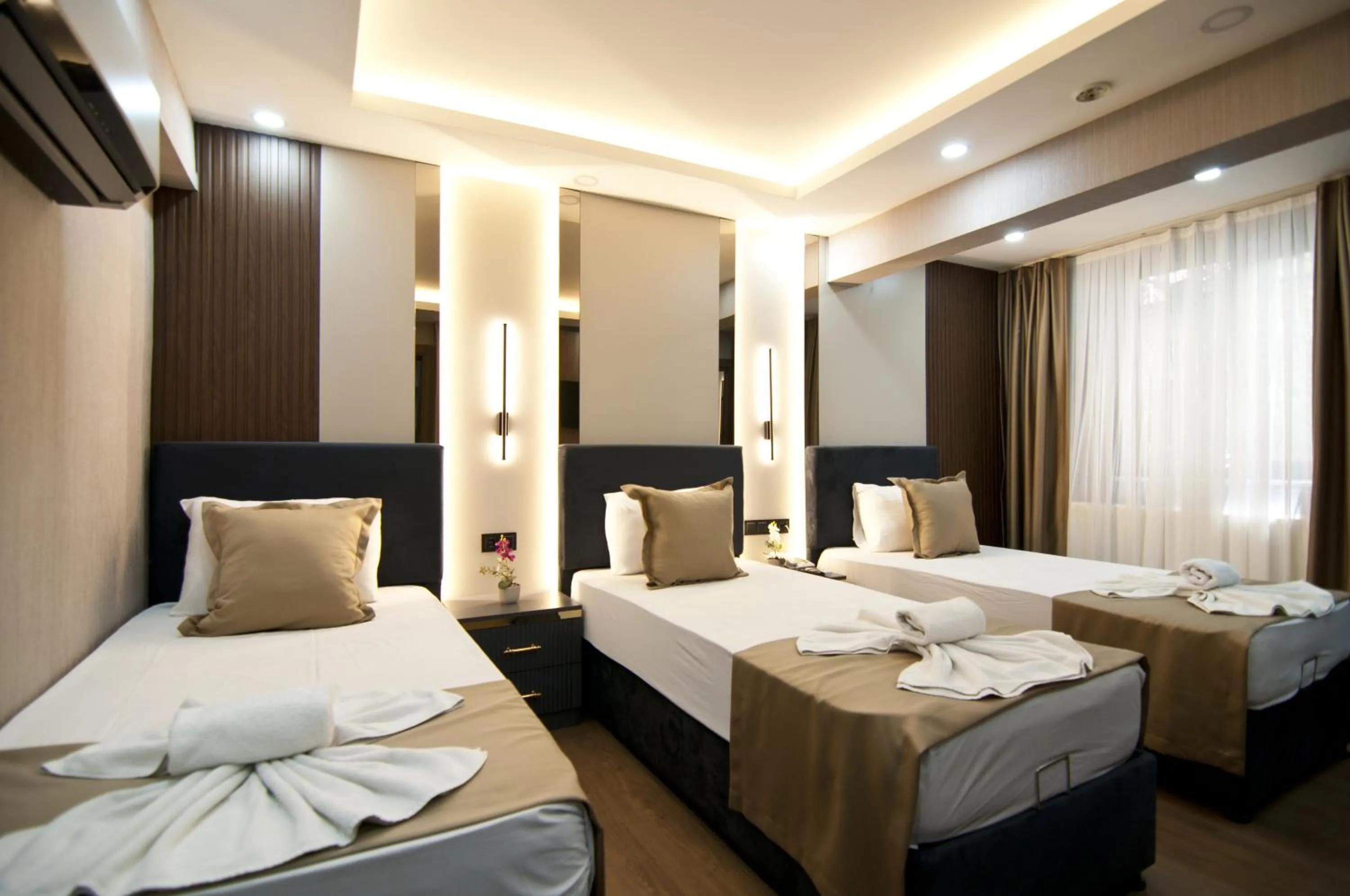 Photo of the whole room, Bed in Grand Bagoz Hotel