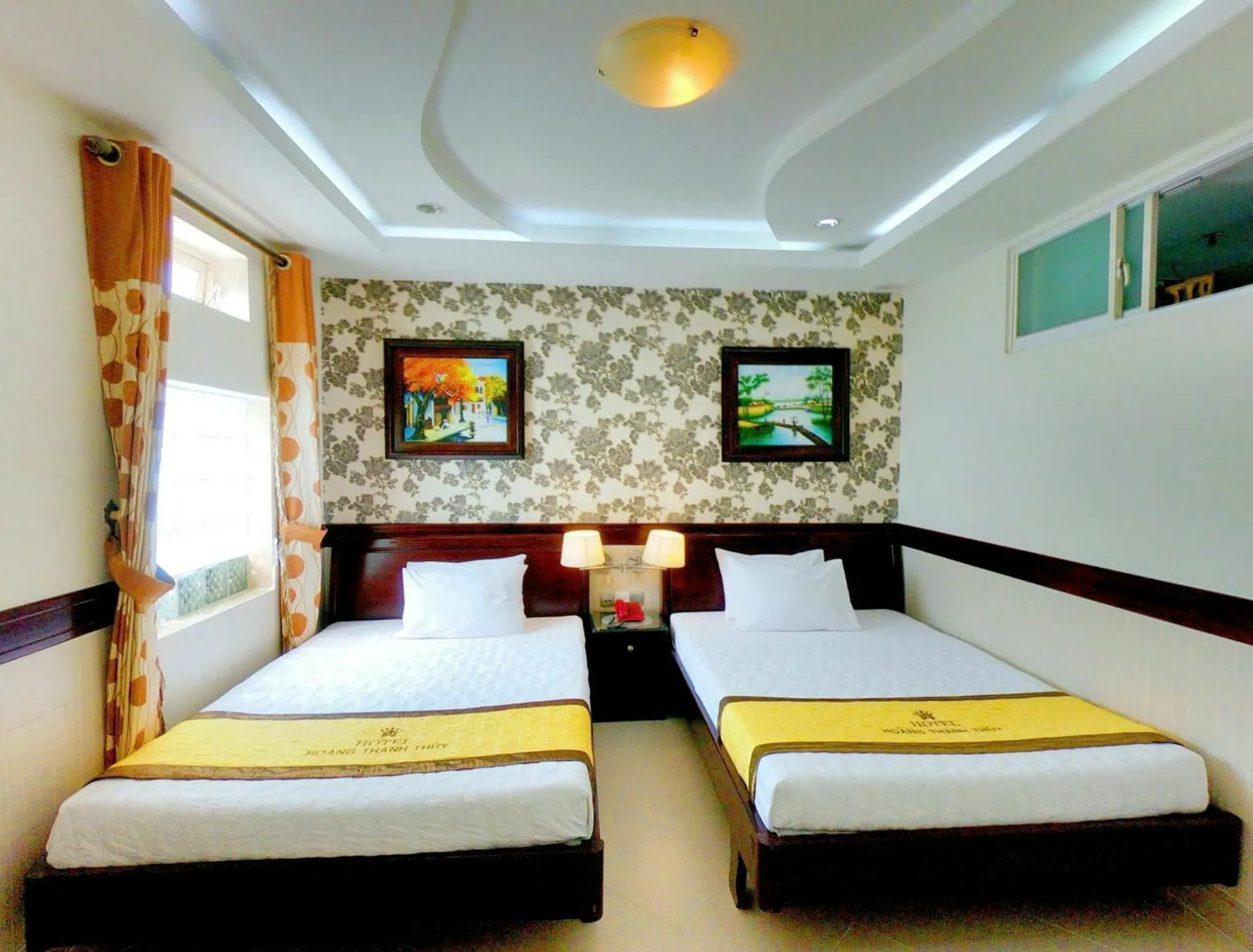 Bed in HOANG THANH THUY AIRPORT HOTEL 2 - Gần Ẩm Thực Đêm Chợ Hoàng Hoa Thám