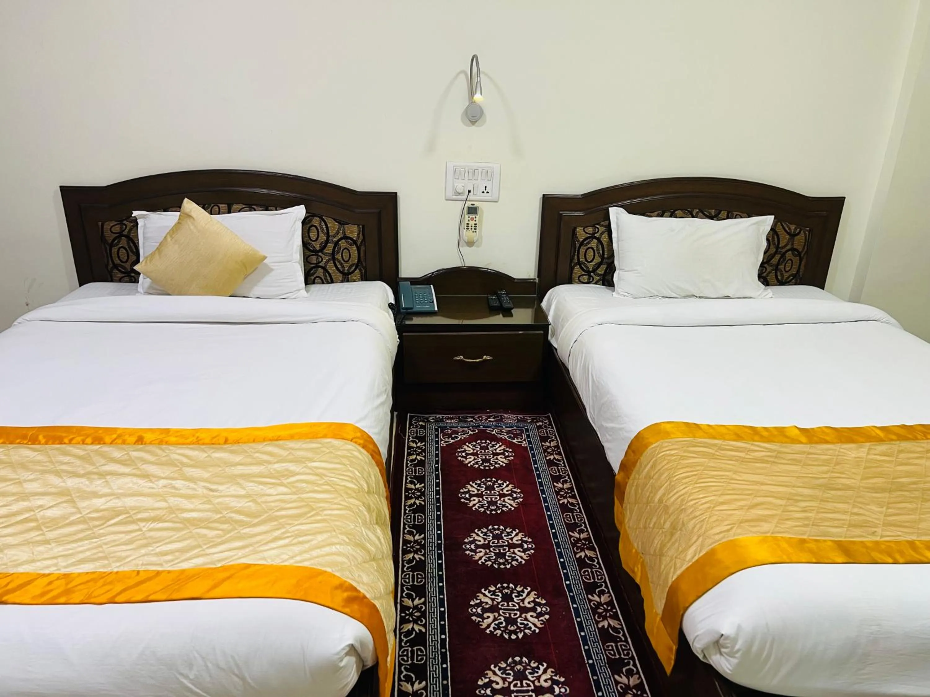 Bedroom, Bed in Bodhgaya Regency Hotel