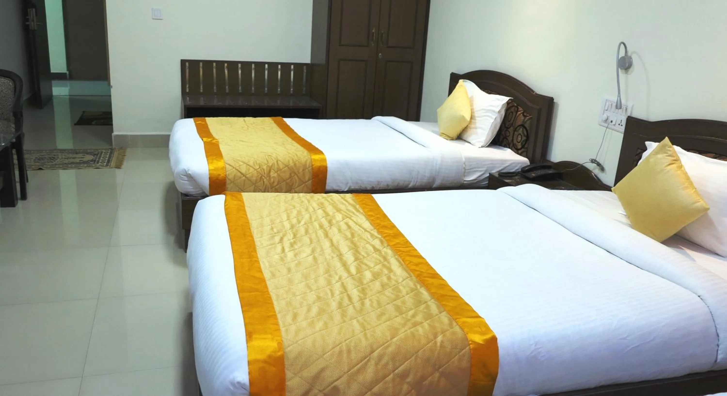 Bed in Bodhgaya Regency Hotel