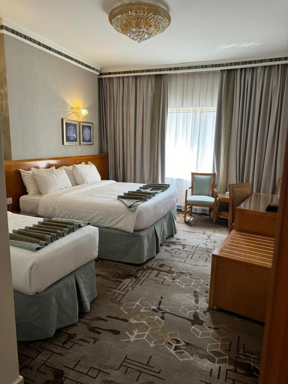 Photo of the whole room, Bed in Emaar Grand Hotel