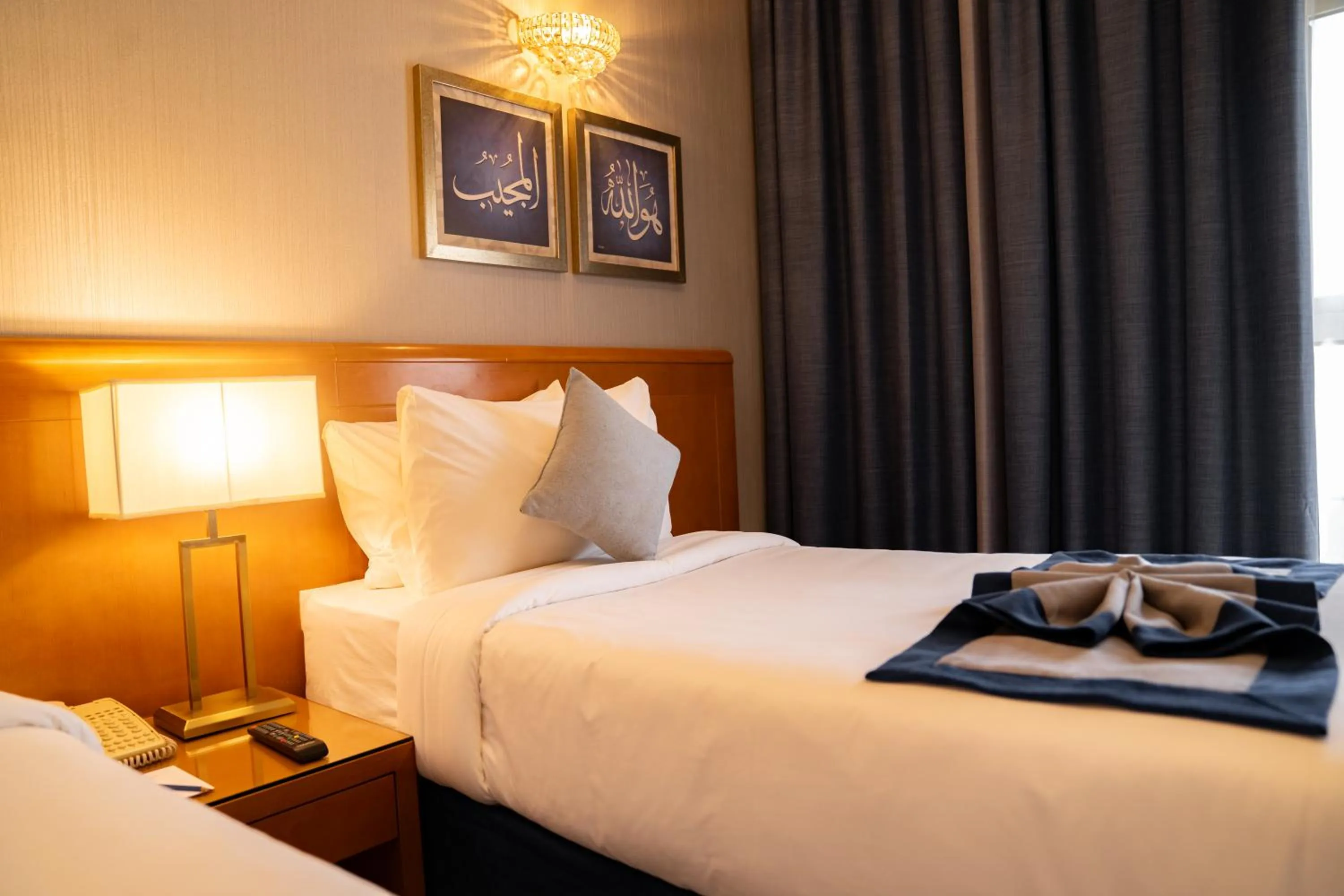 Bed in Emaar Grand Hotel