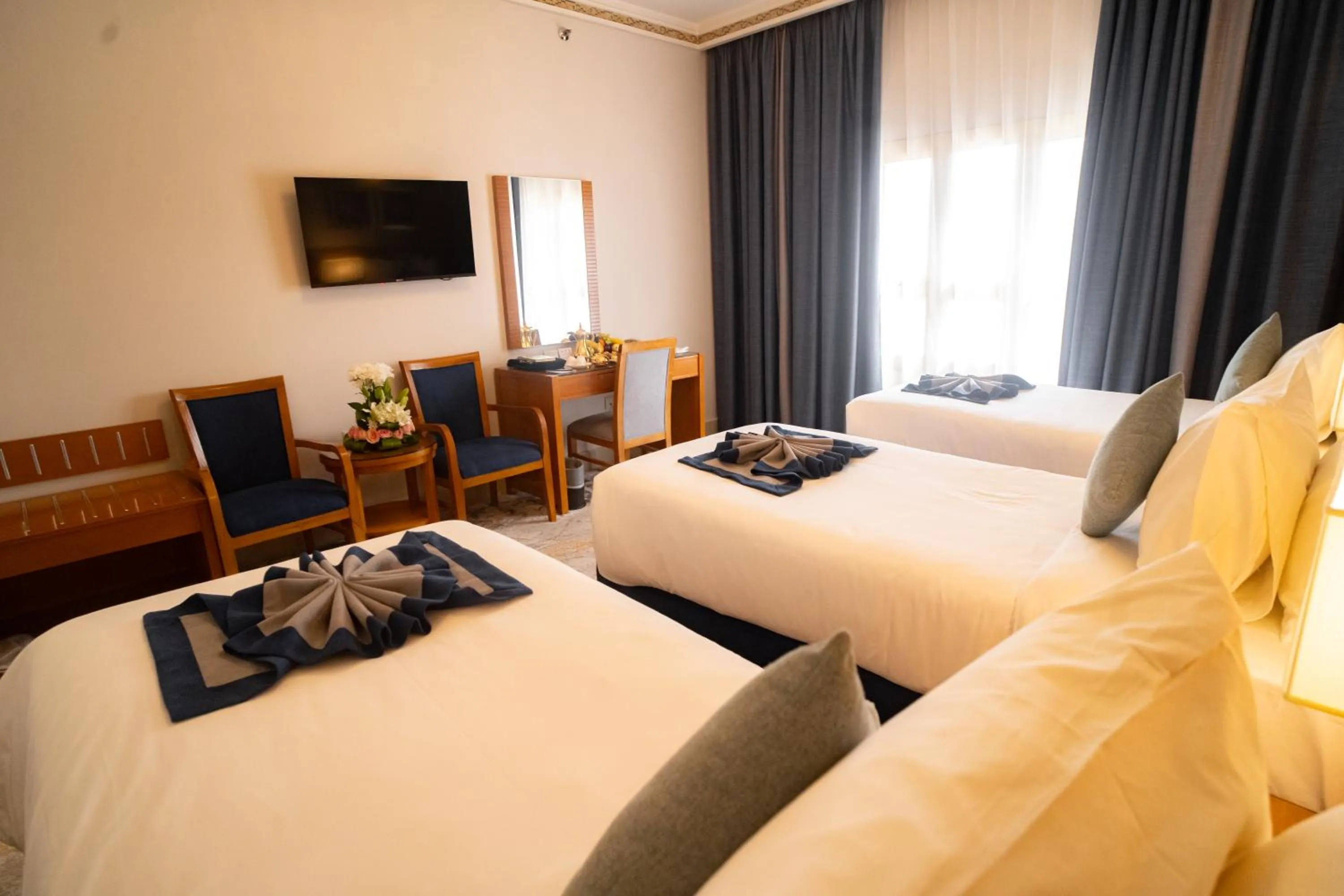 Bed in Emaar Grand Hotel