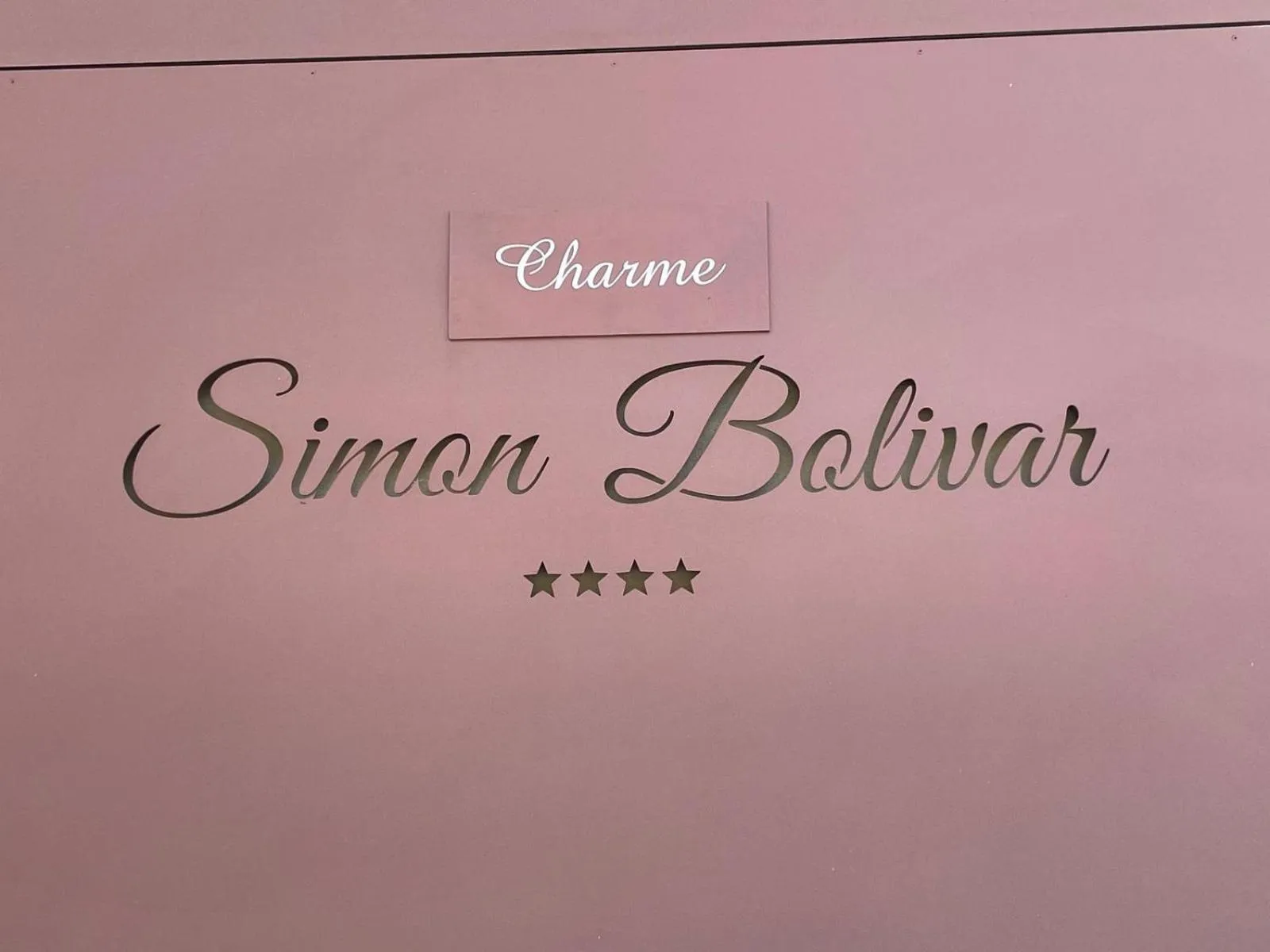Property logo or sign in Charme SIMON BOLIVAR