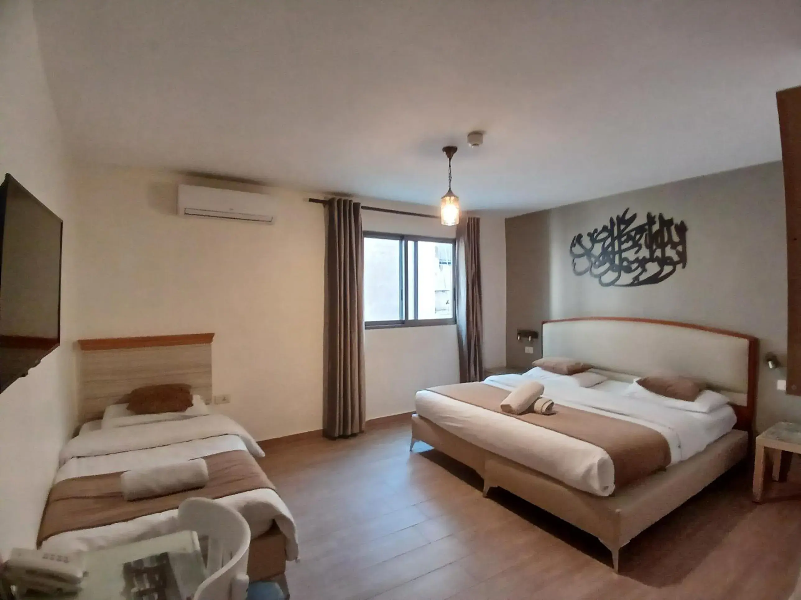 Comfort Triple Room in Layaali Amman Hotel Comfort Triple Room in Layaali Amman Hotel