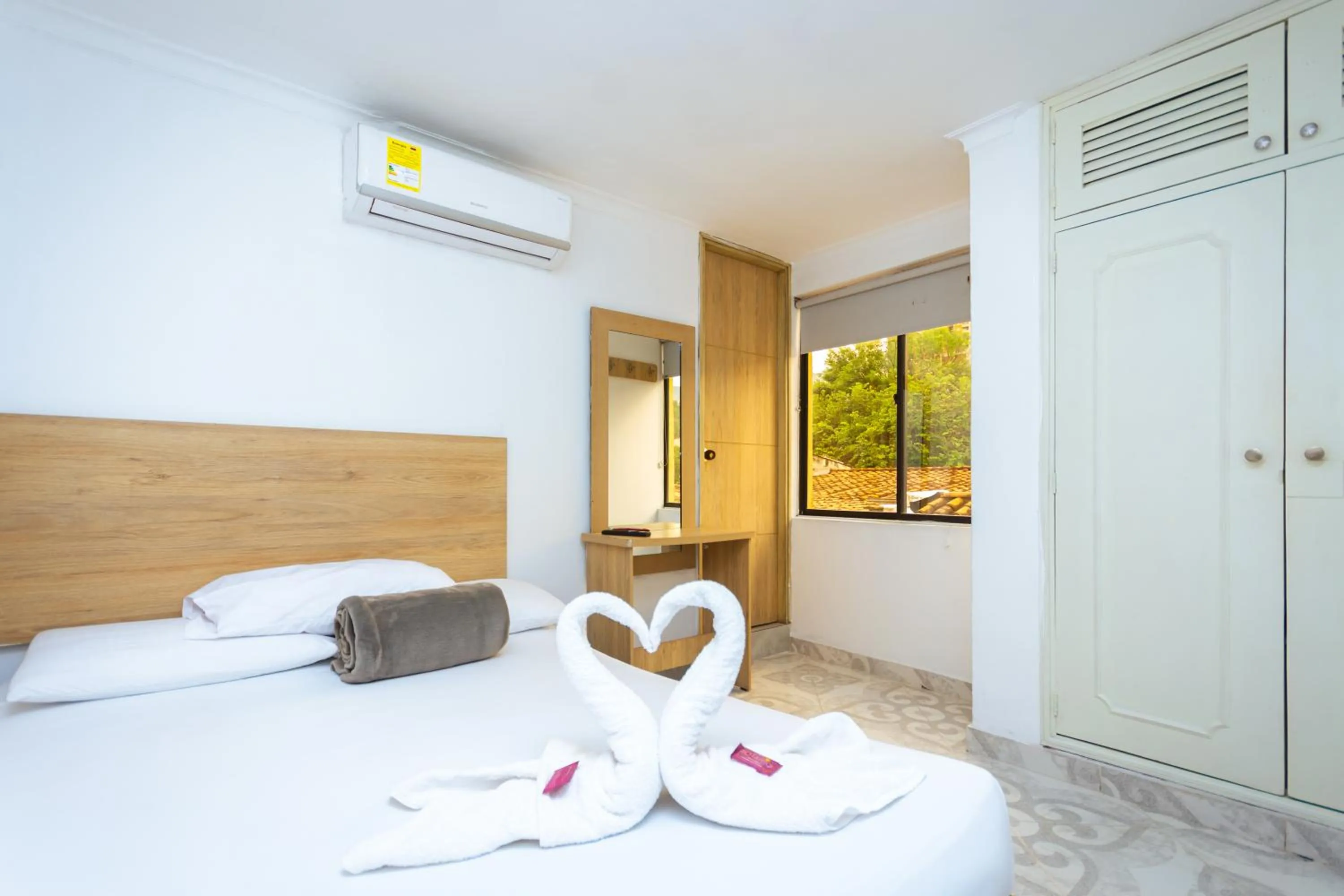 Bed in Hotel Colores Boutique