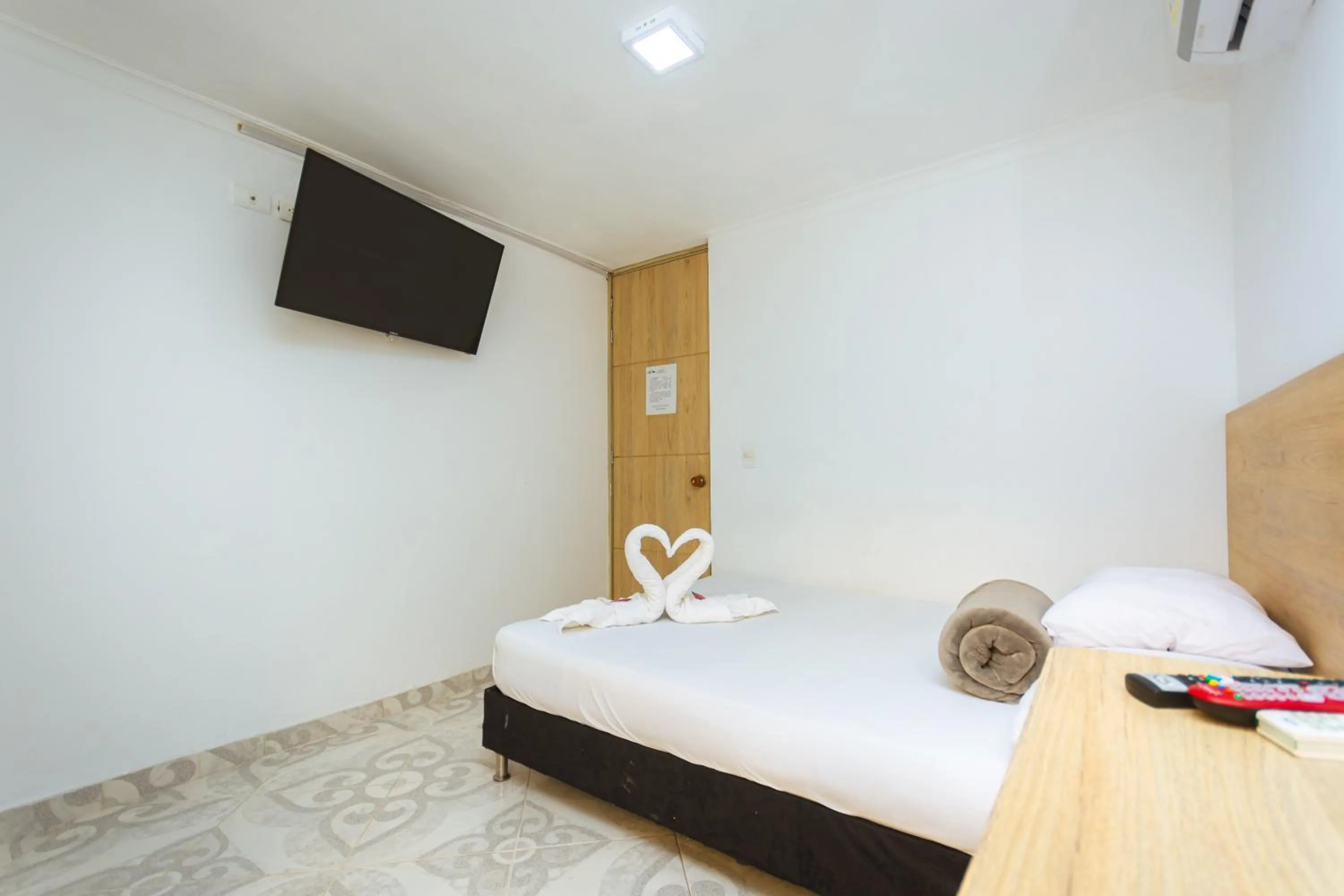 Bed in Hotel Colores Boutique