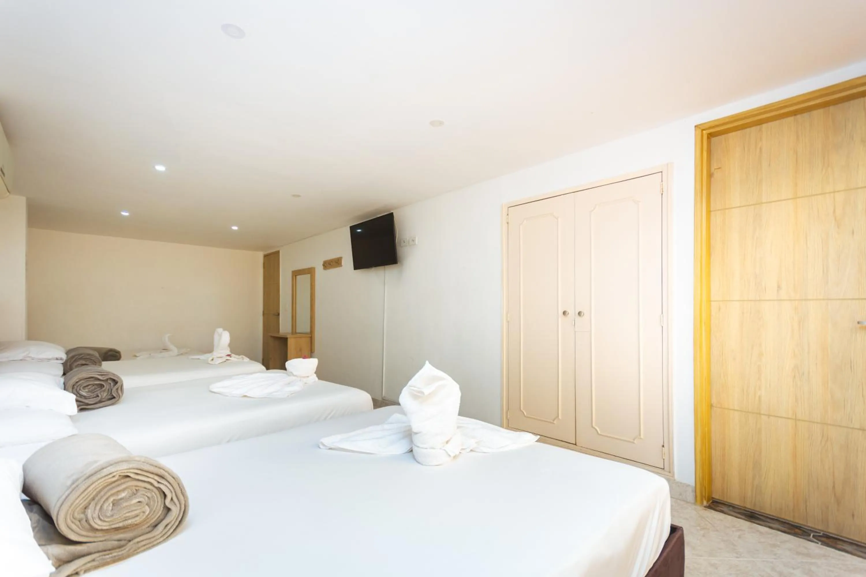 Bed in Hotel Colores Boutique