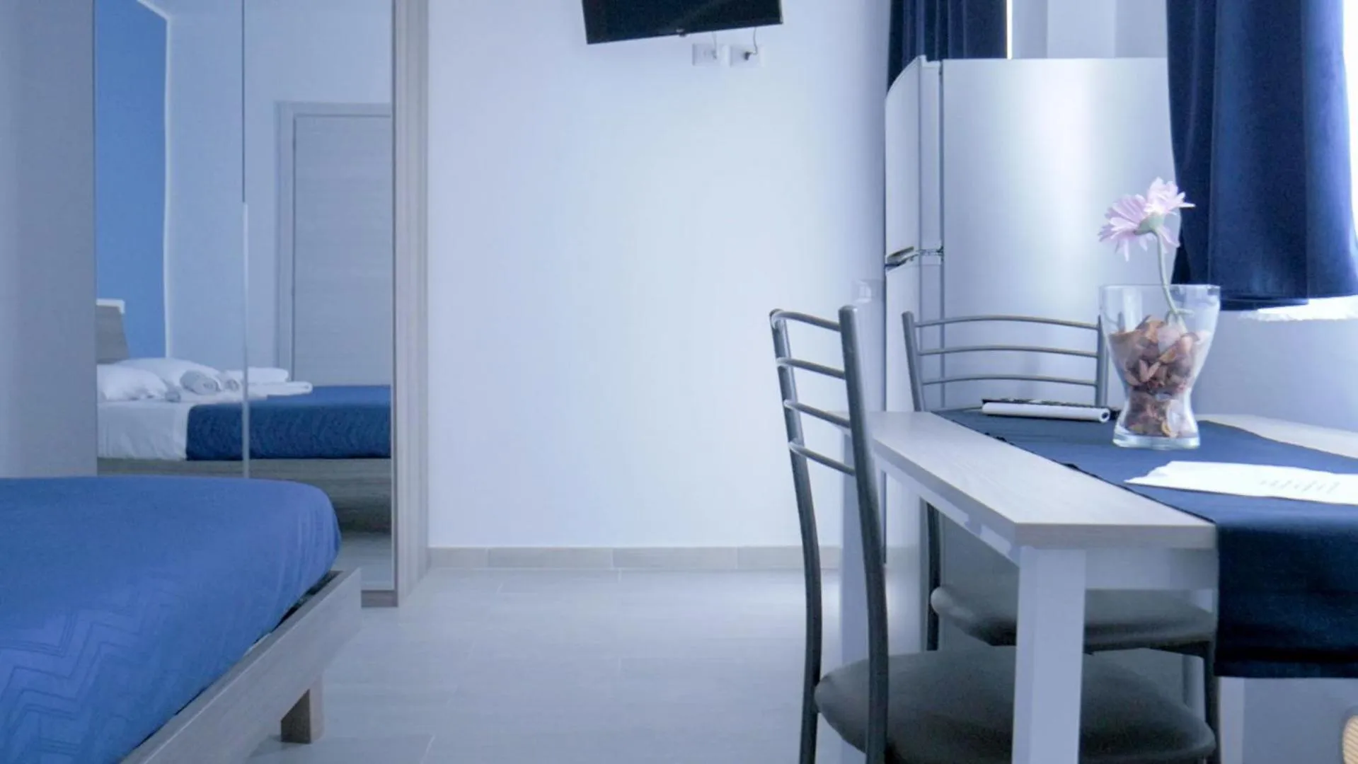 Bed in Naxos Laguna Beach