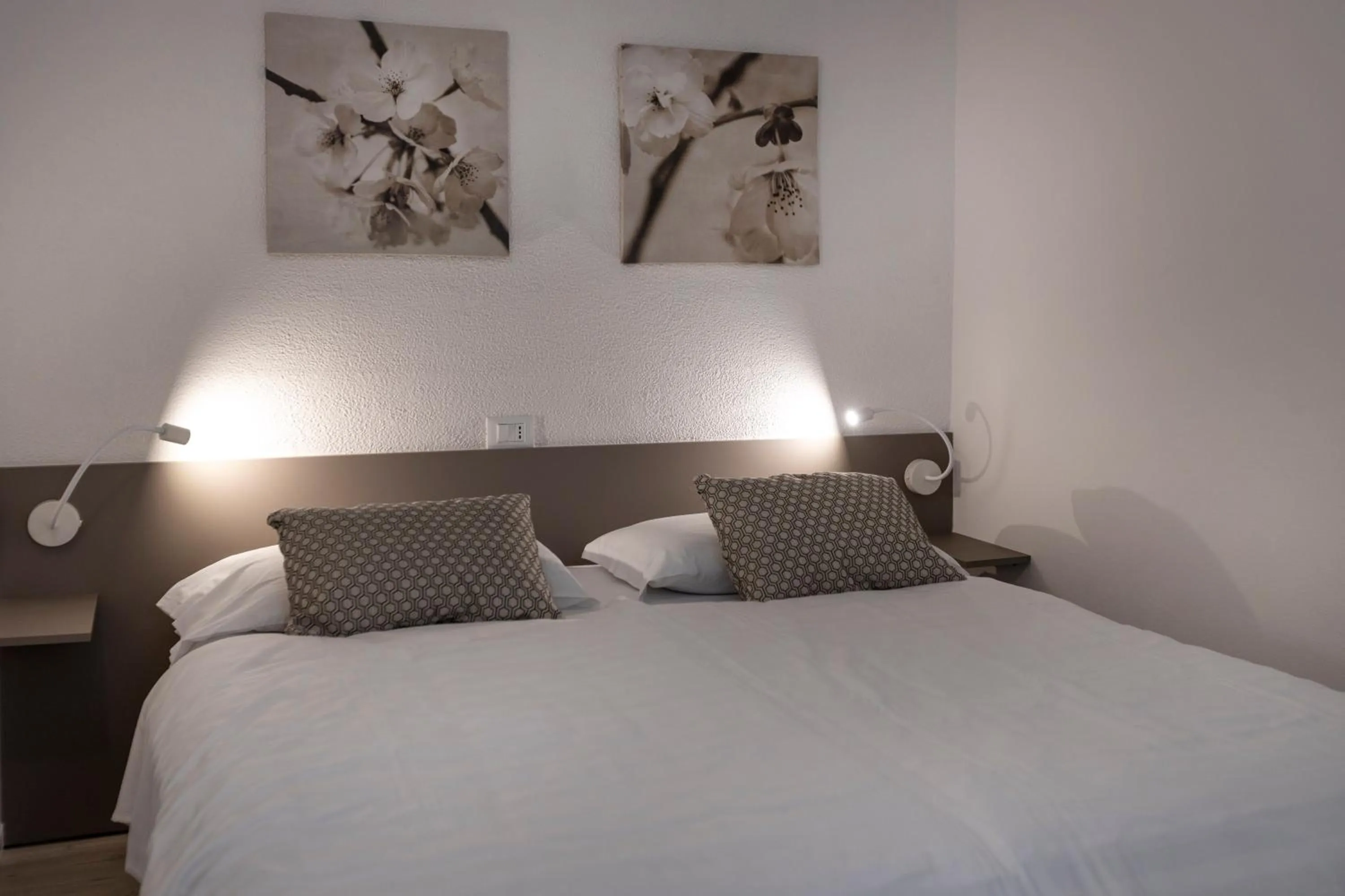 Bed in Hotel Roma Aparthotel