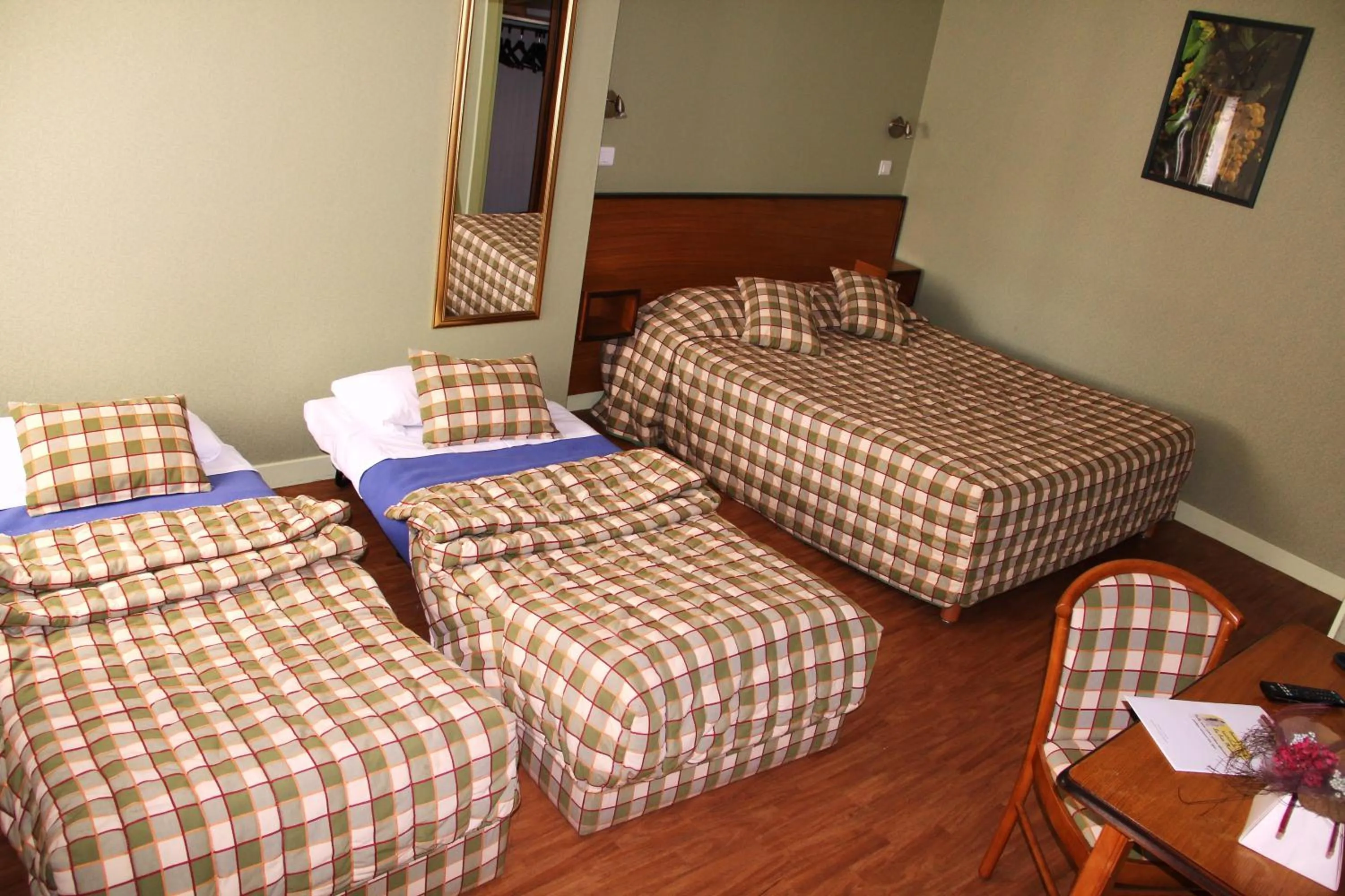 Photo of the whole room, Bed in Logis Des Trois Maures