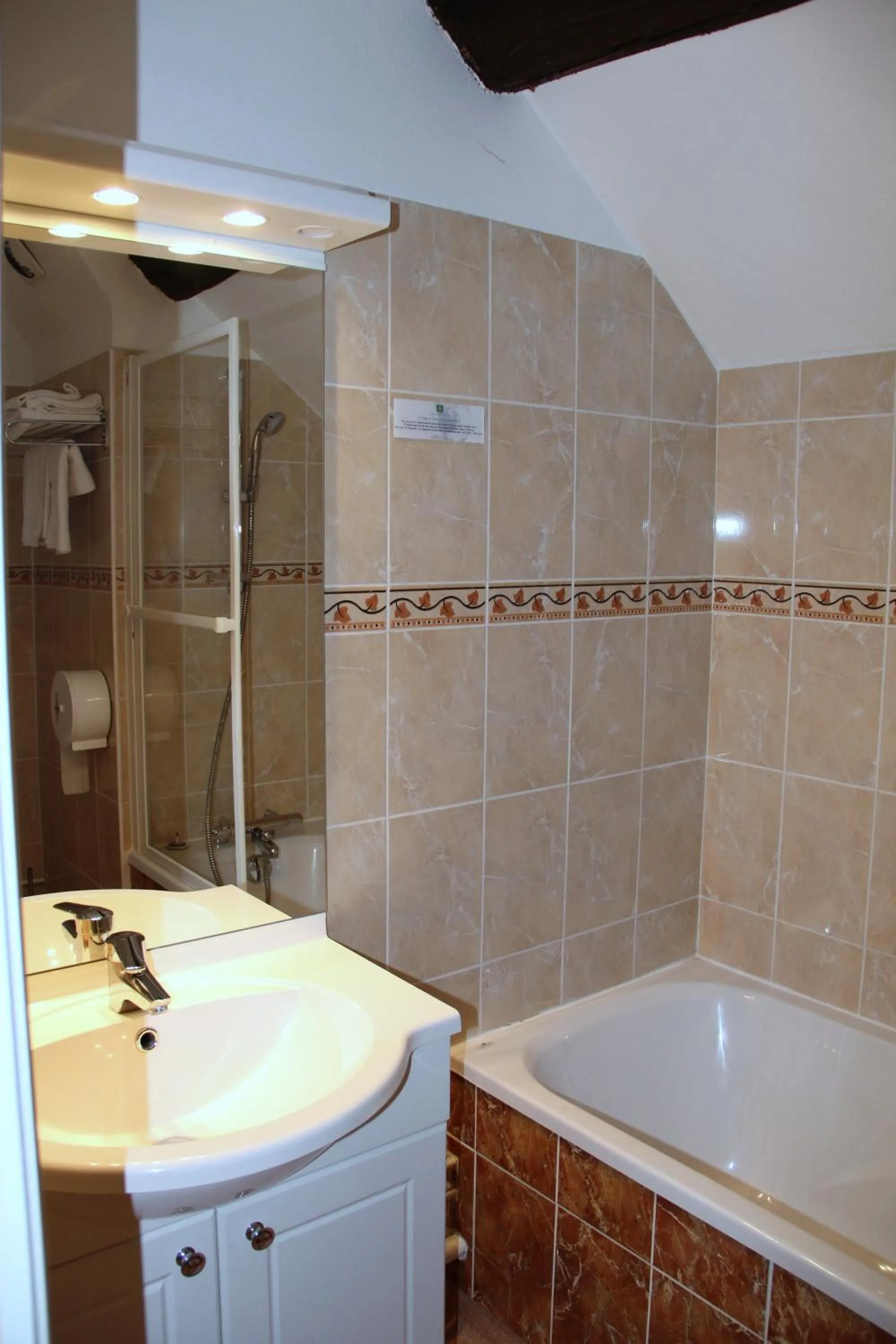 Bathroom in Logis Des Trois Maures