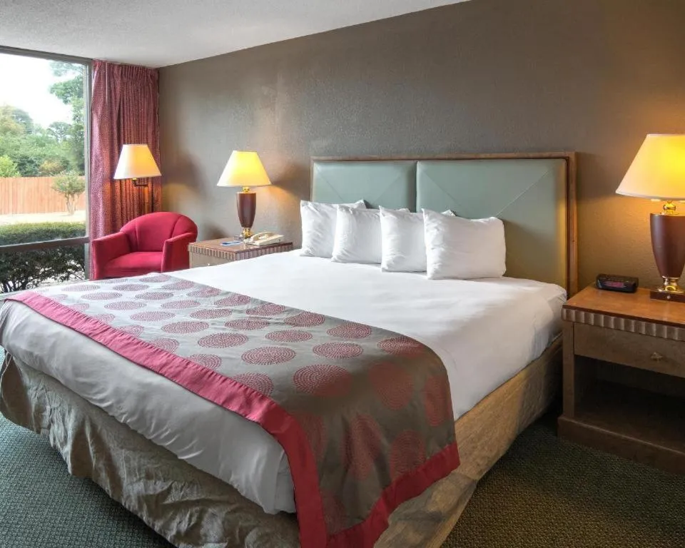 Bed in Economy Inn & Suites