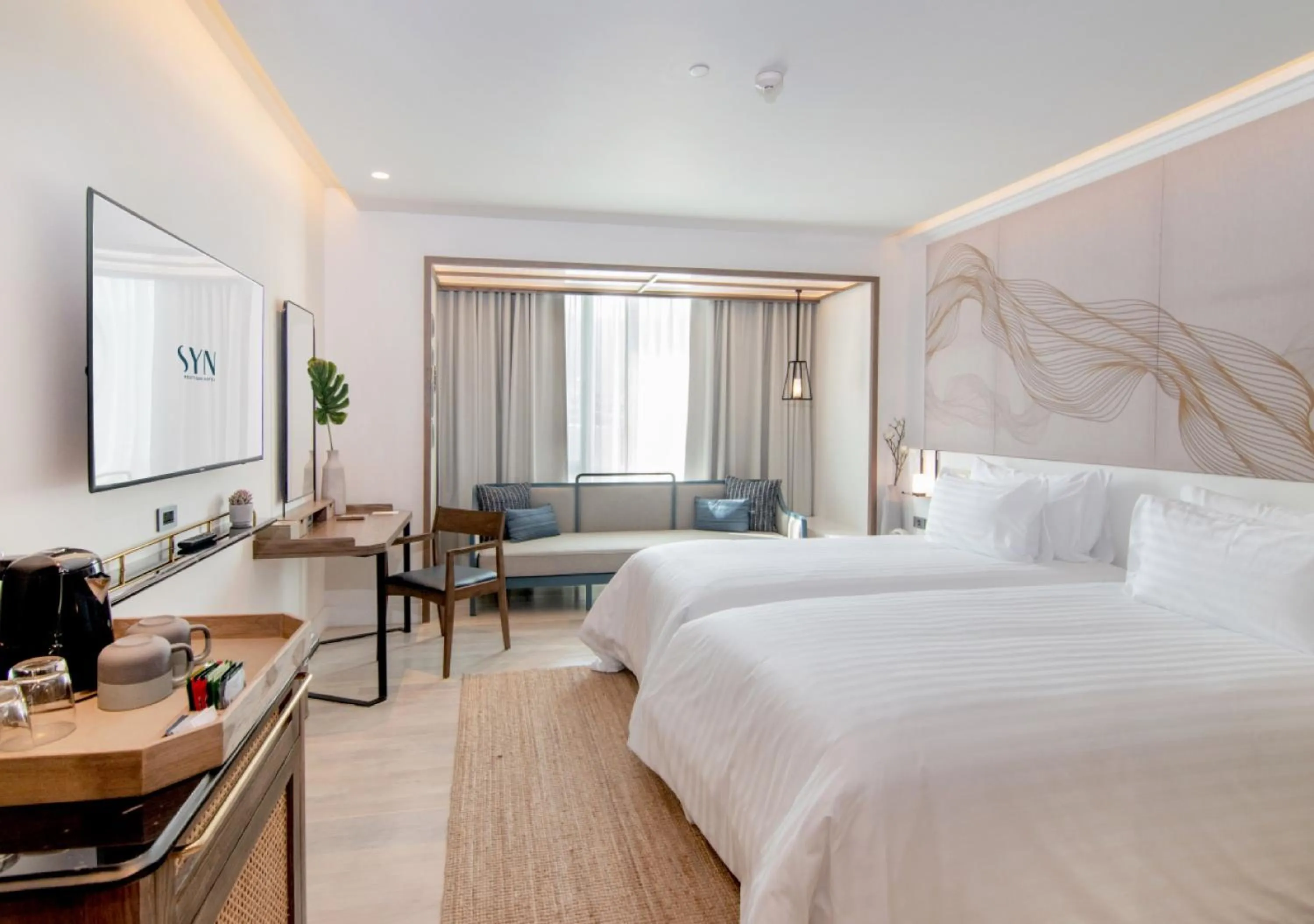 Photo of the whole room, Bed in SYN Boutique Hotel