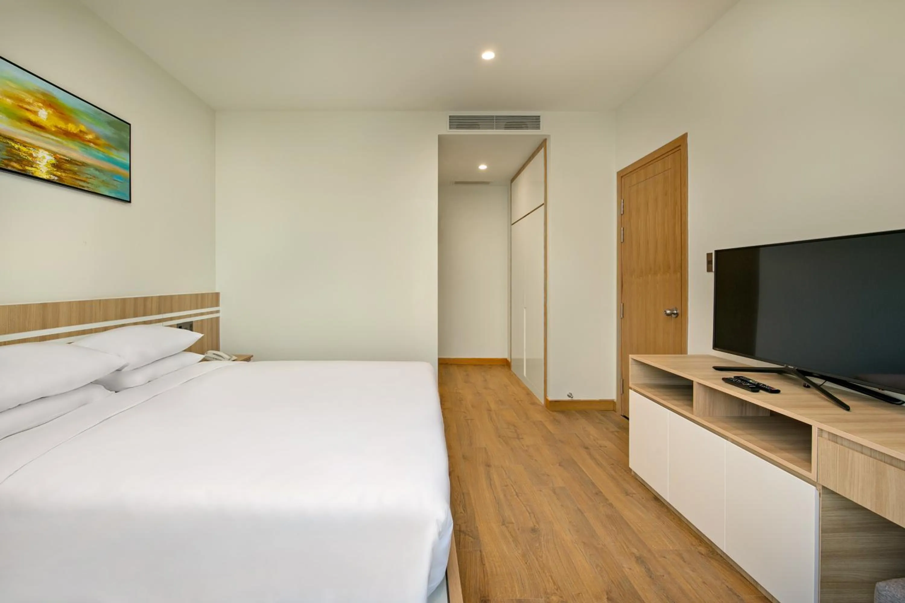 Bed in Sun River Hotel & Apartment