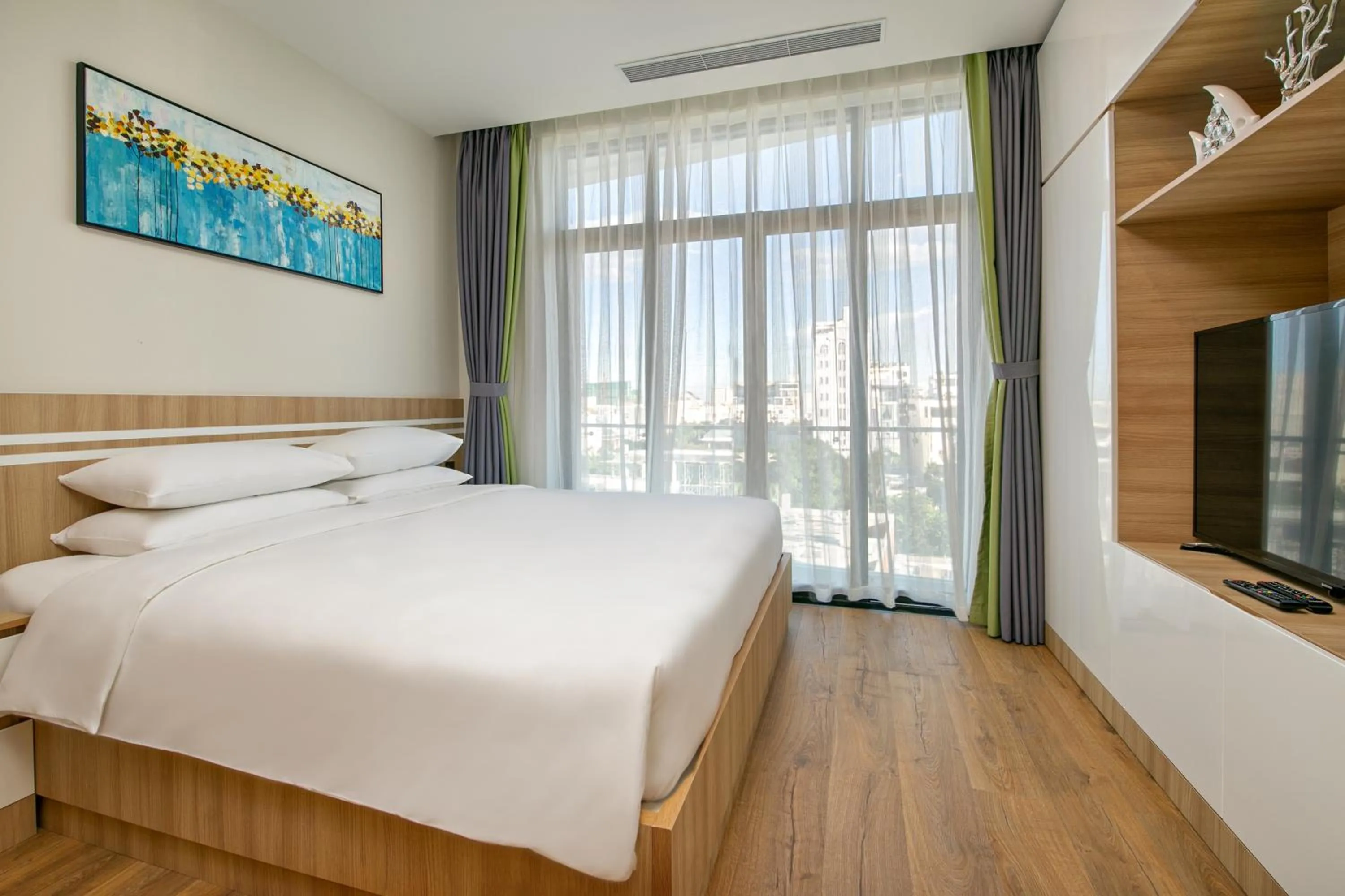 Bed in Sun River Hotel & Apartment