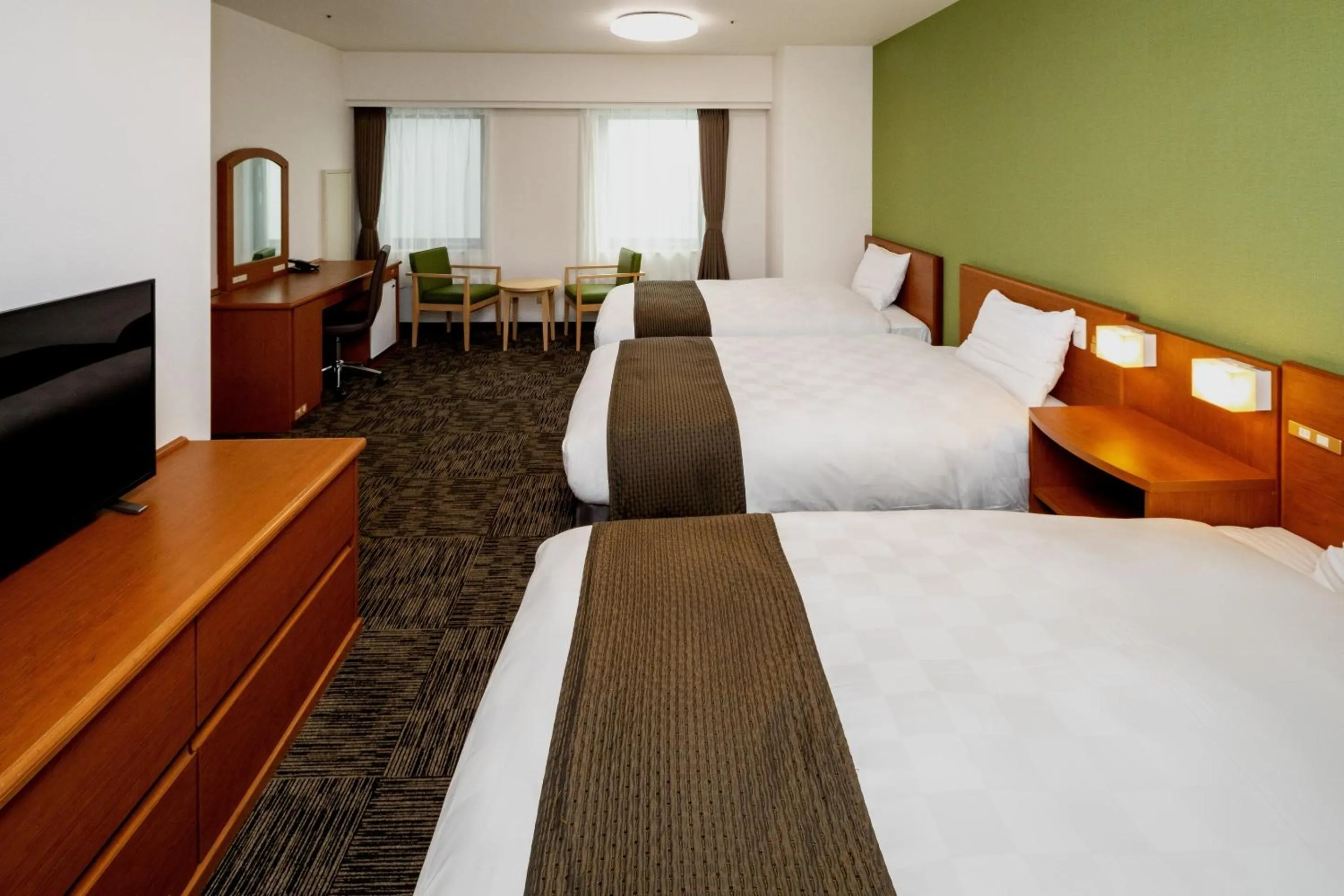 Bed in Kumamoto Tokyu REI Hotel