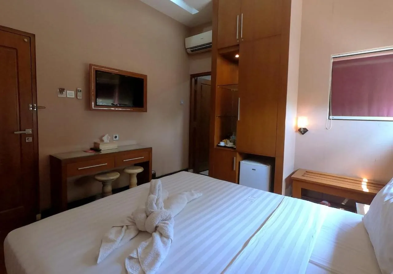 Photo of the whole room, Bed in Omah Qu Guesthouse Malioboro