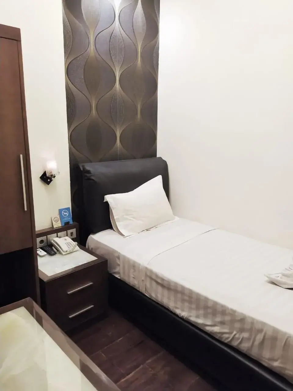 Standard Single Room with Shared Bathroom in Omah Qu Guesthouse Malioboro Standard Single Room with Shared Bathroom in Omah Qu Guesthouse Malioboro