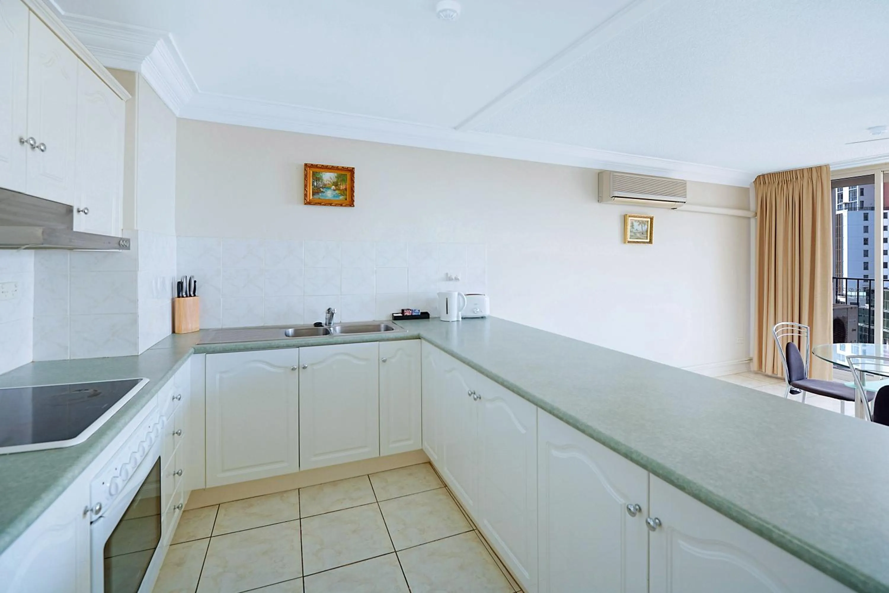 Kitchen or kitchenette in Condor Apartments by Gold Coast Premium