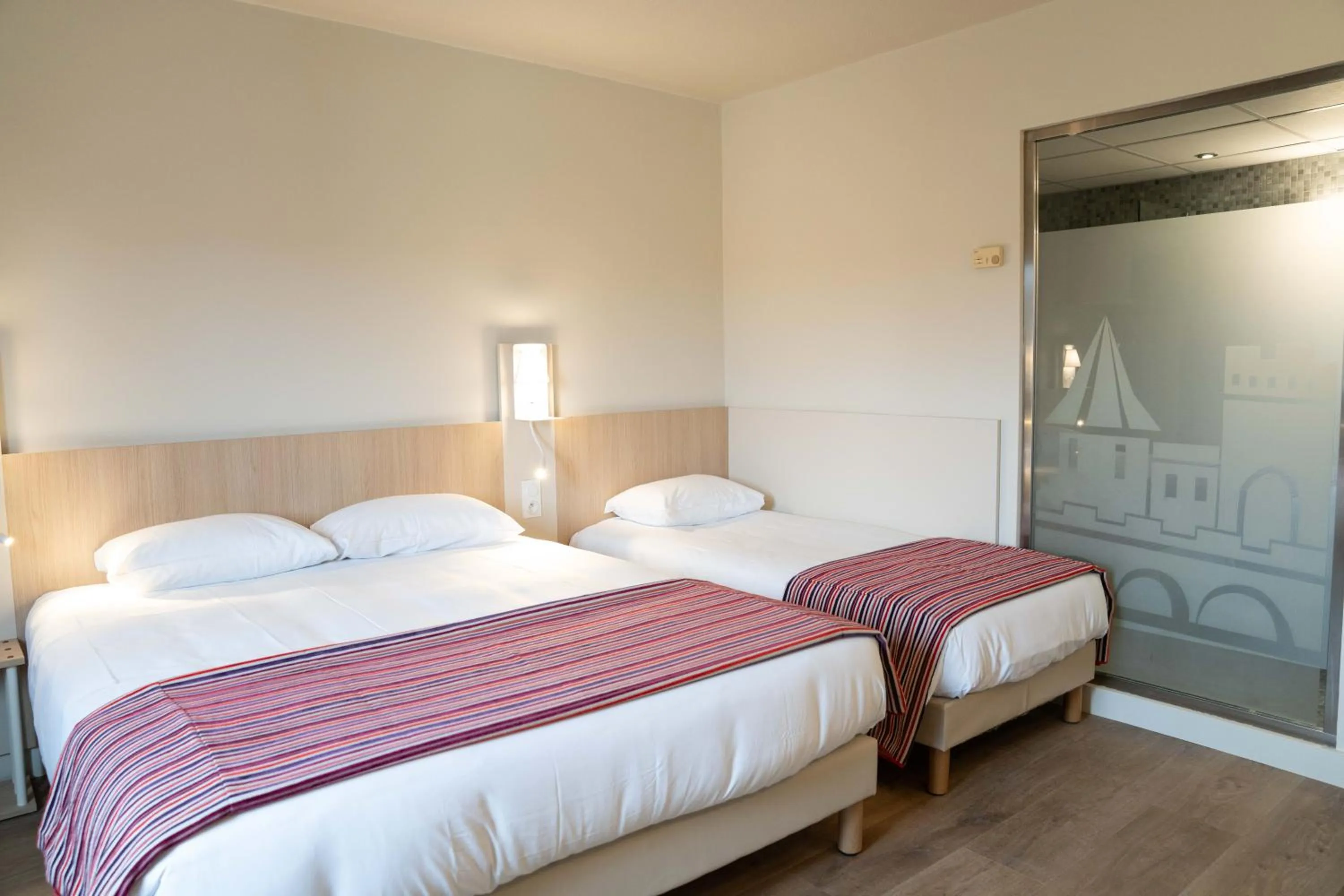 Bed in Hotel Espace Cite