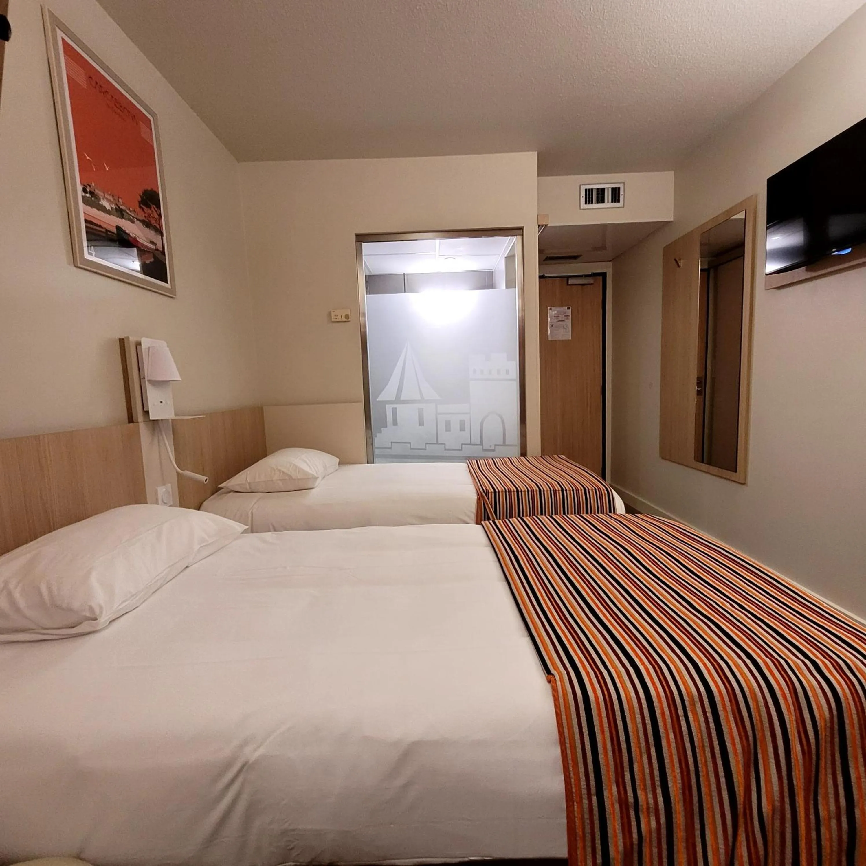 Bed in Hotel Espace Cite