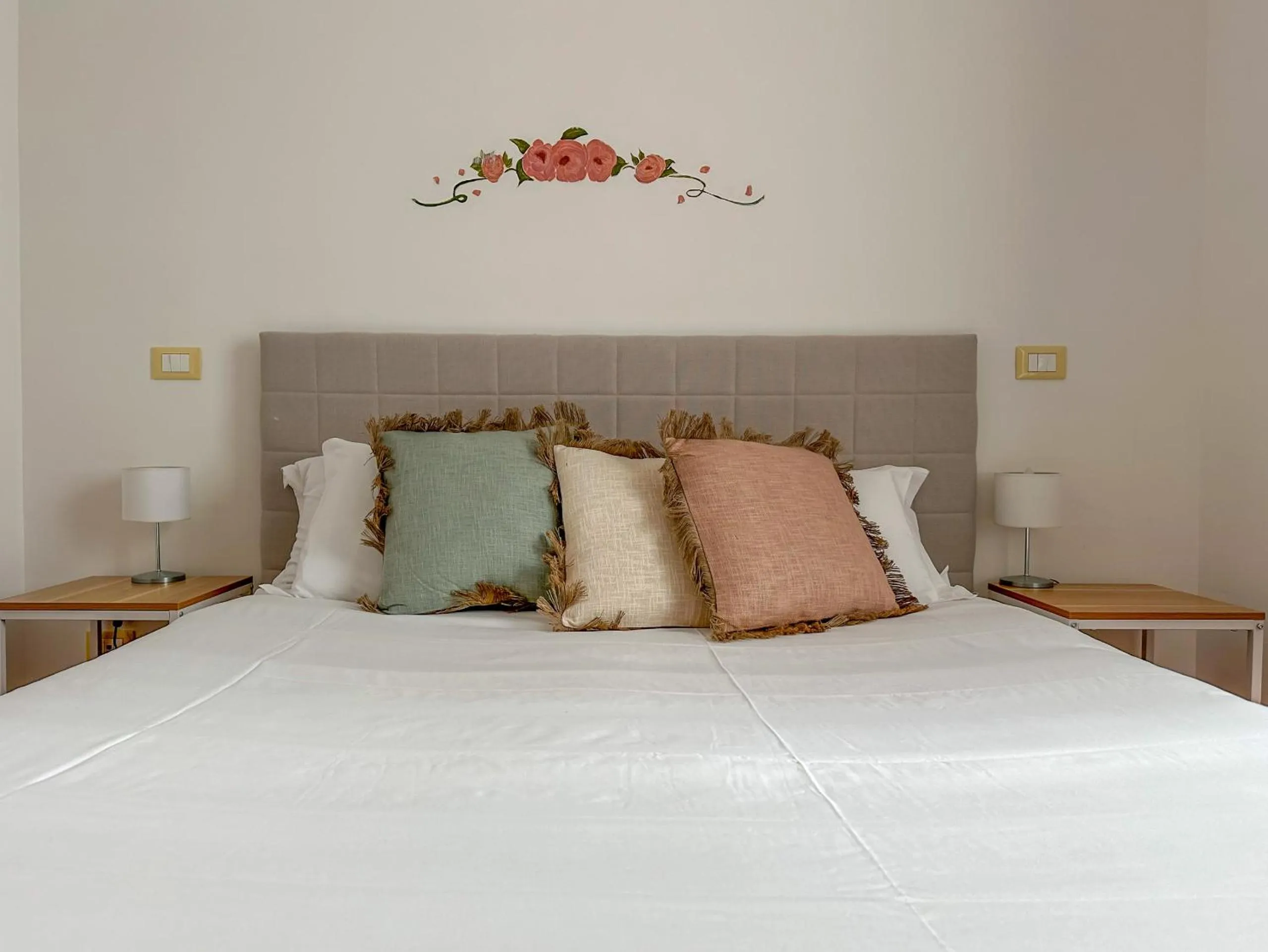 Bed in Flowers apartments & rooms