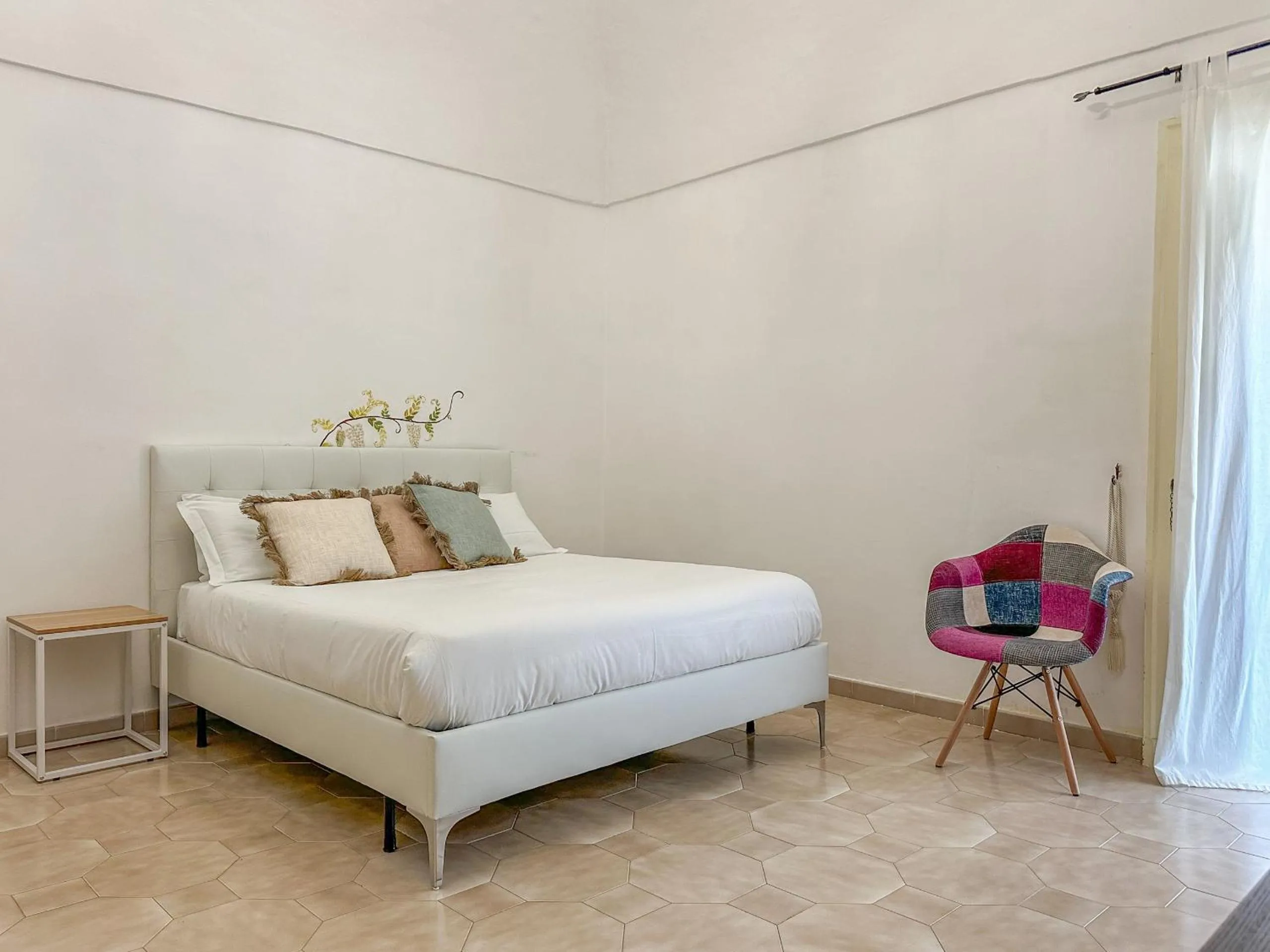 Bed in Flowers apartments & rooms