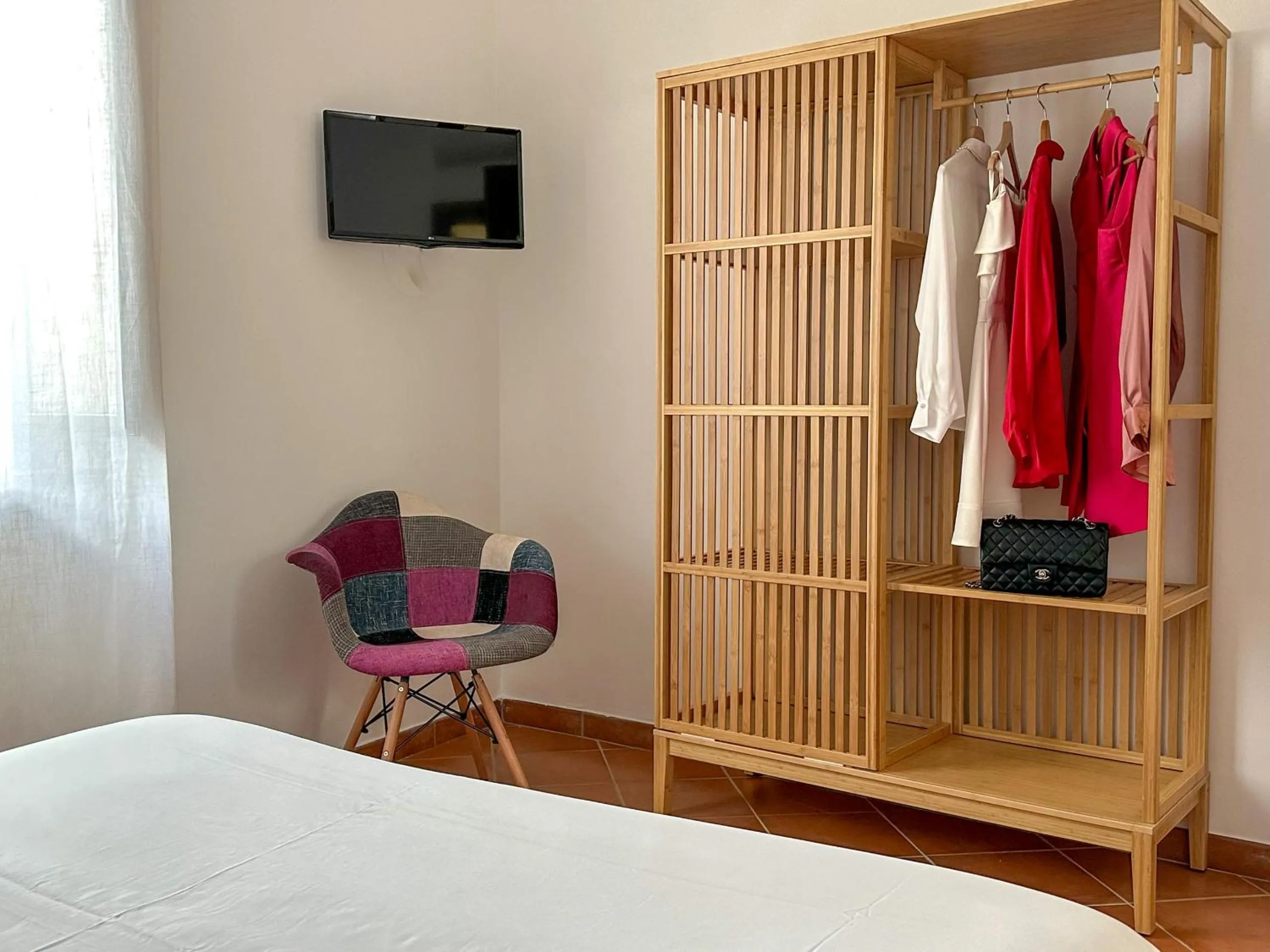 Bed in Flowers apartments & rooms