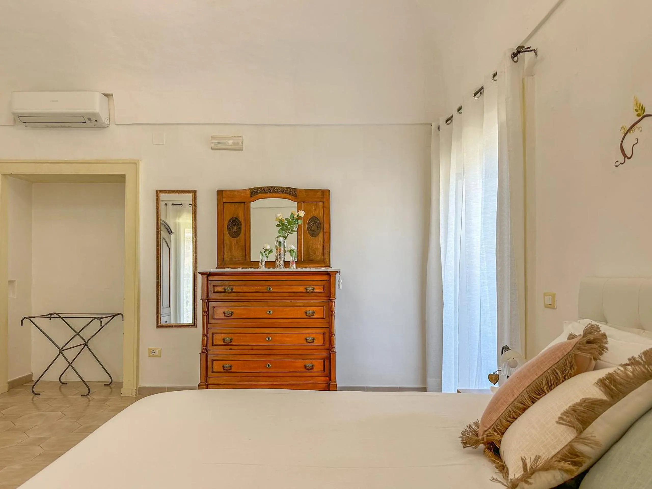 Bed in Flowers apartments & rooms