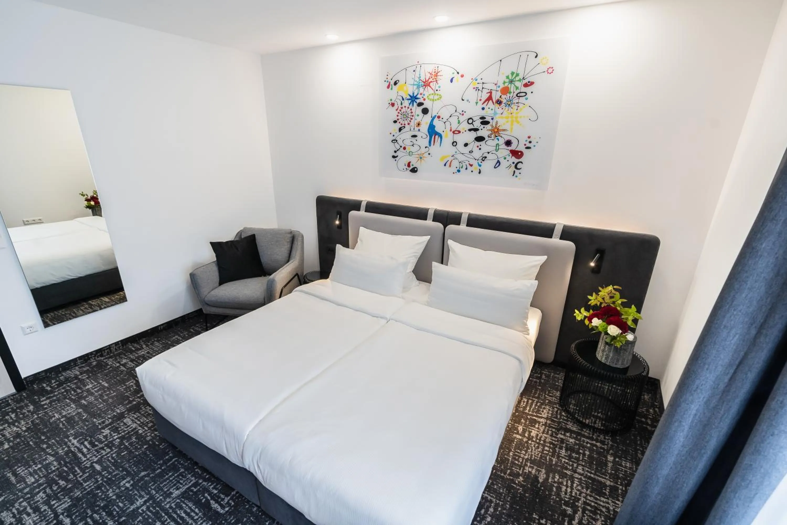 Seating area, Bed in Libarty Hotels