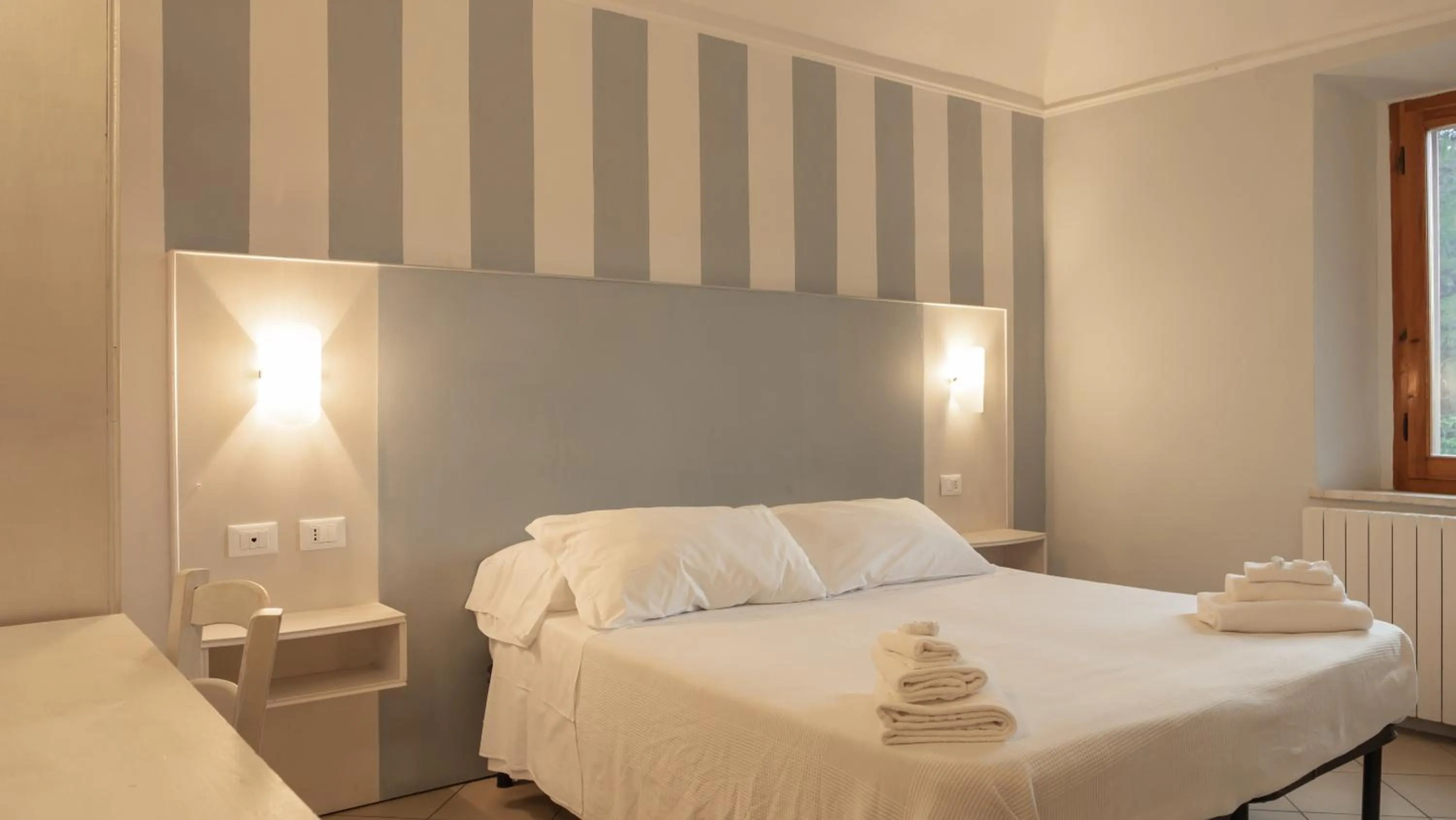 Bedroom in Hotel La Smorfia