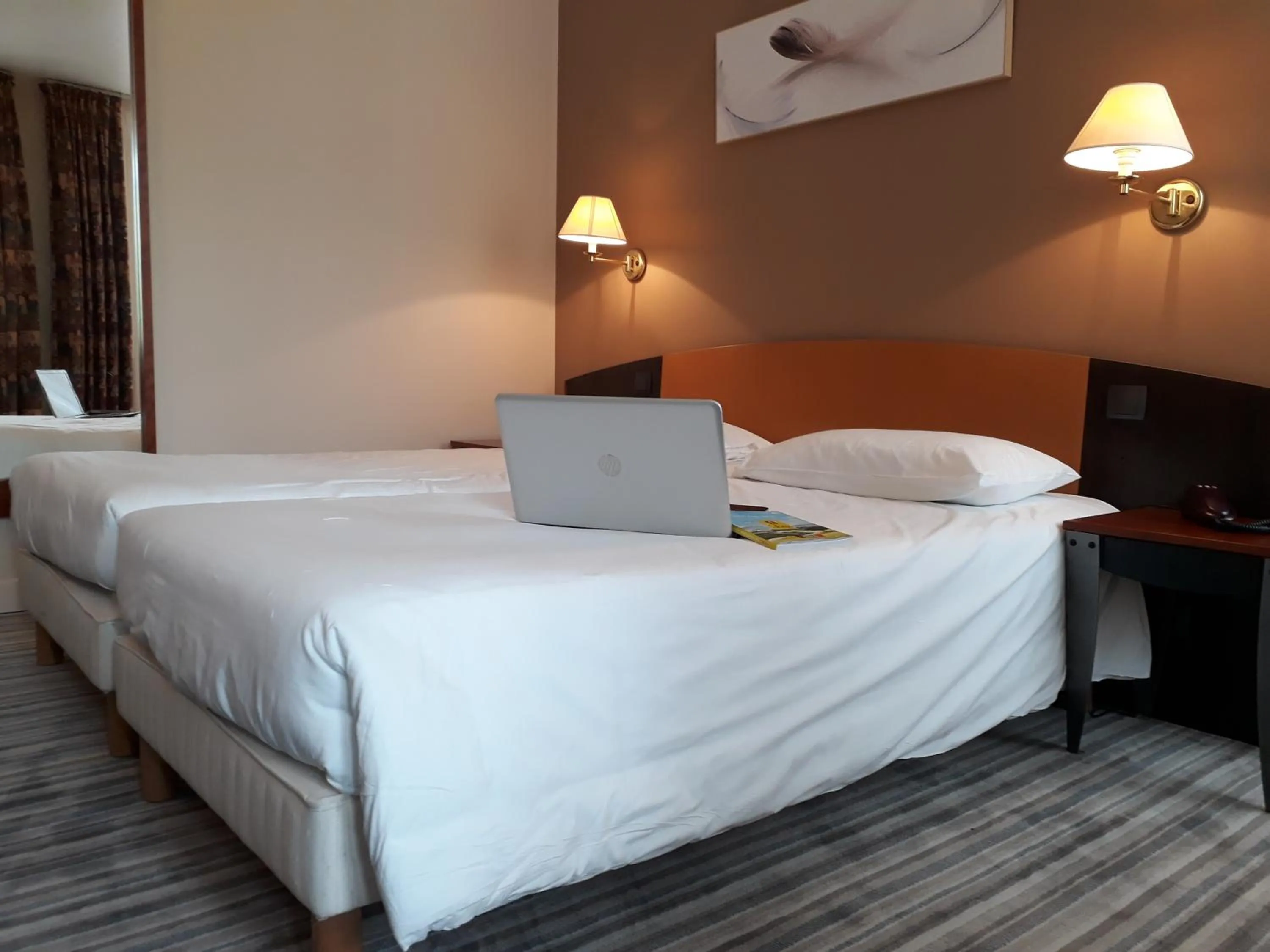 Bed in Logis Le Relais de Fusies