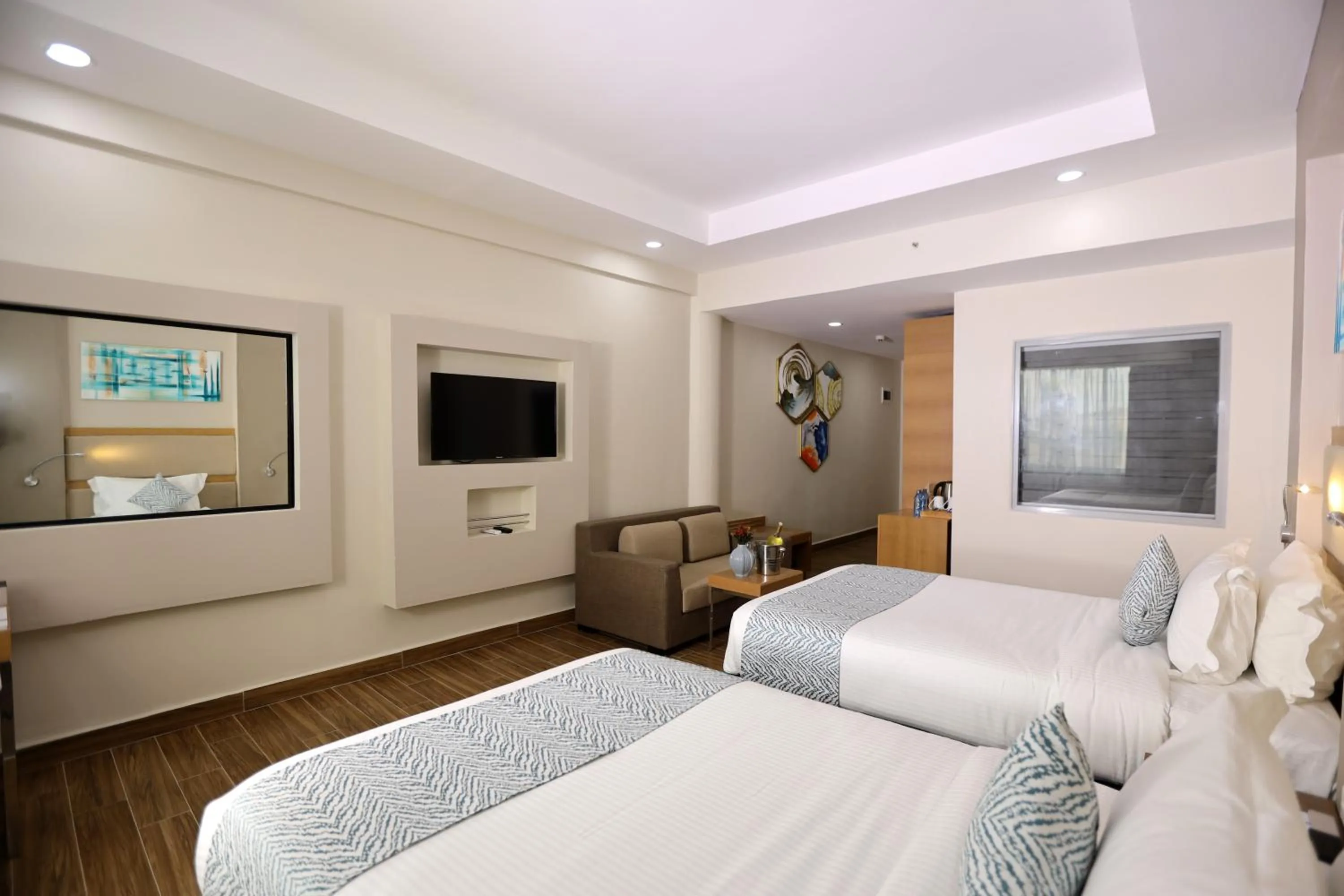Communal lounge/ TV room, Bed in PrideInn Plaza Nairobi Airport