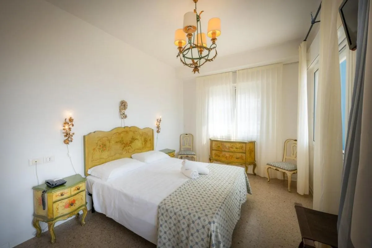 Bed in Hotel Tizian Beach