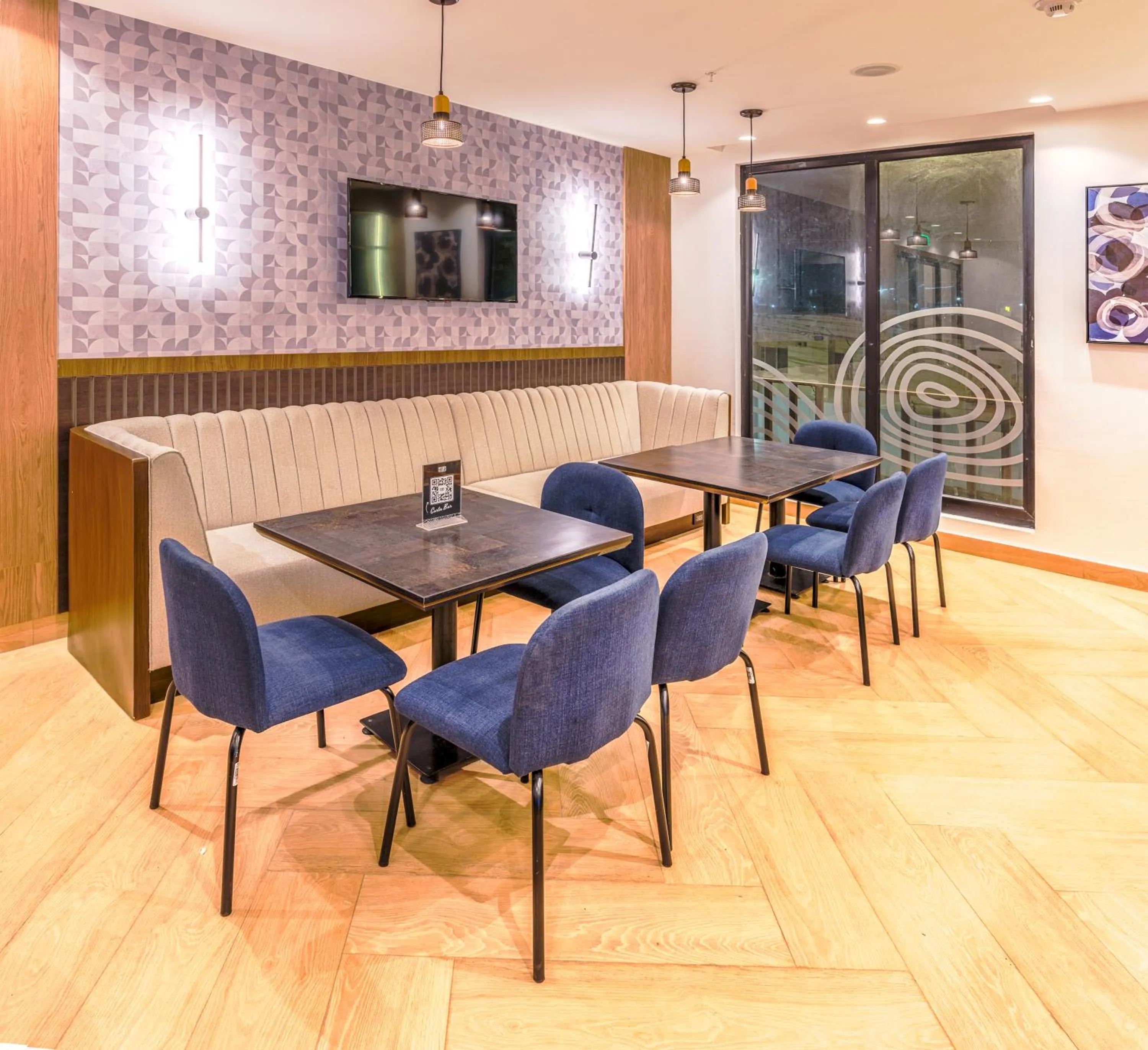 Lounge or bar in REEC Machala by Oro Verde Hotels