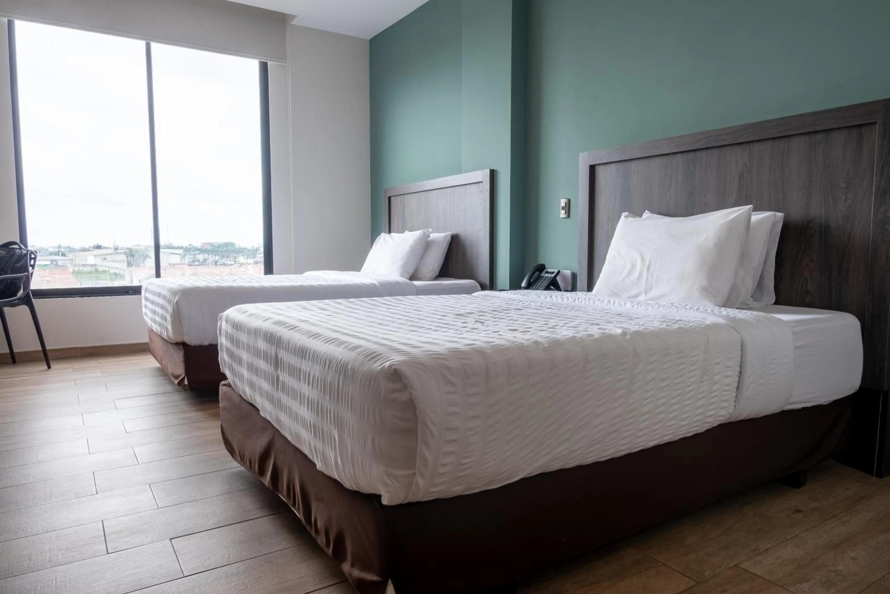 Photo of the whole room, Bed in REEC Machala by Oro Verde Hotels