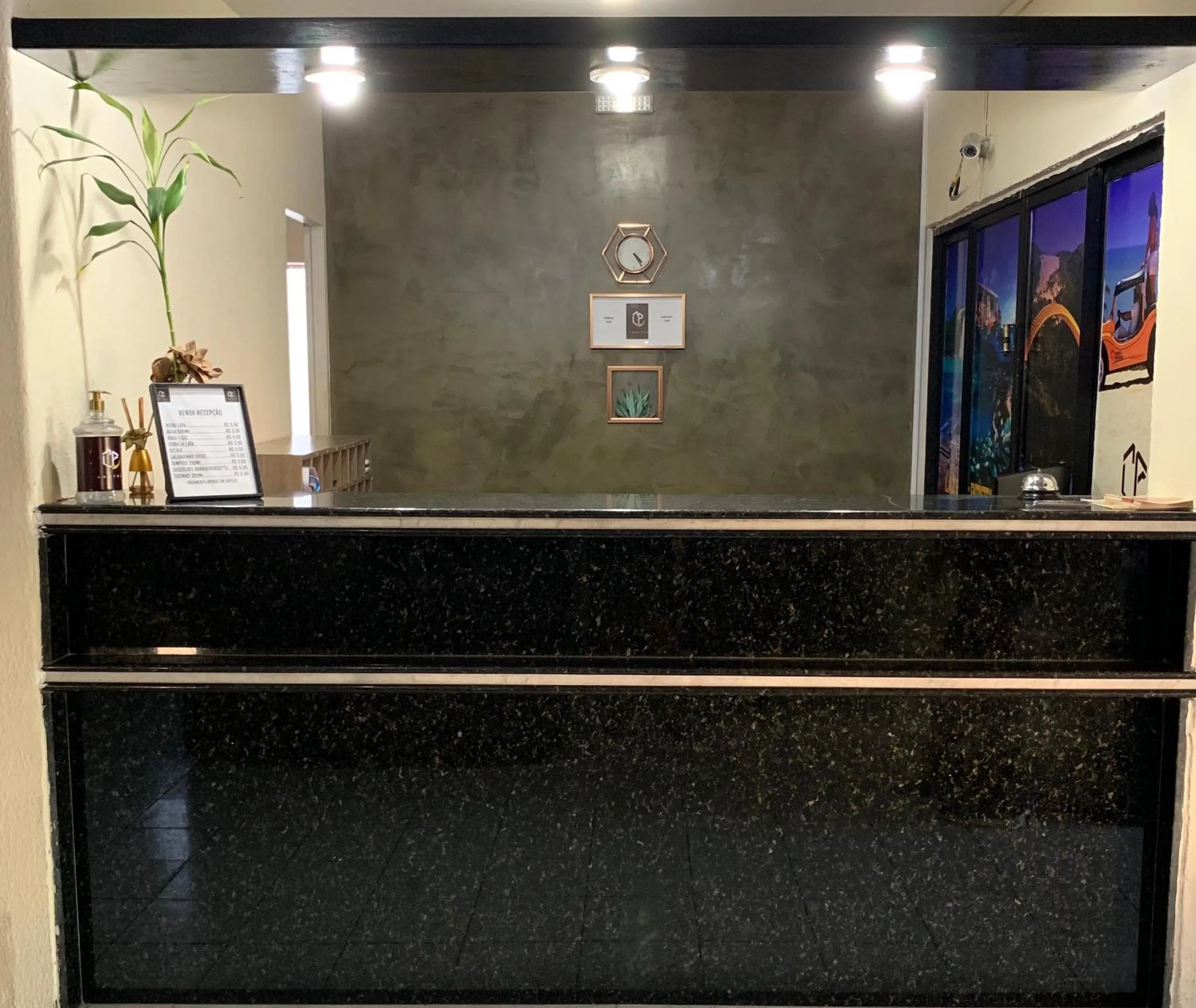 Communal lounge/ TV room in CP Hotel Economic