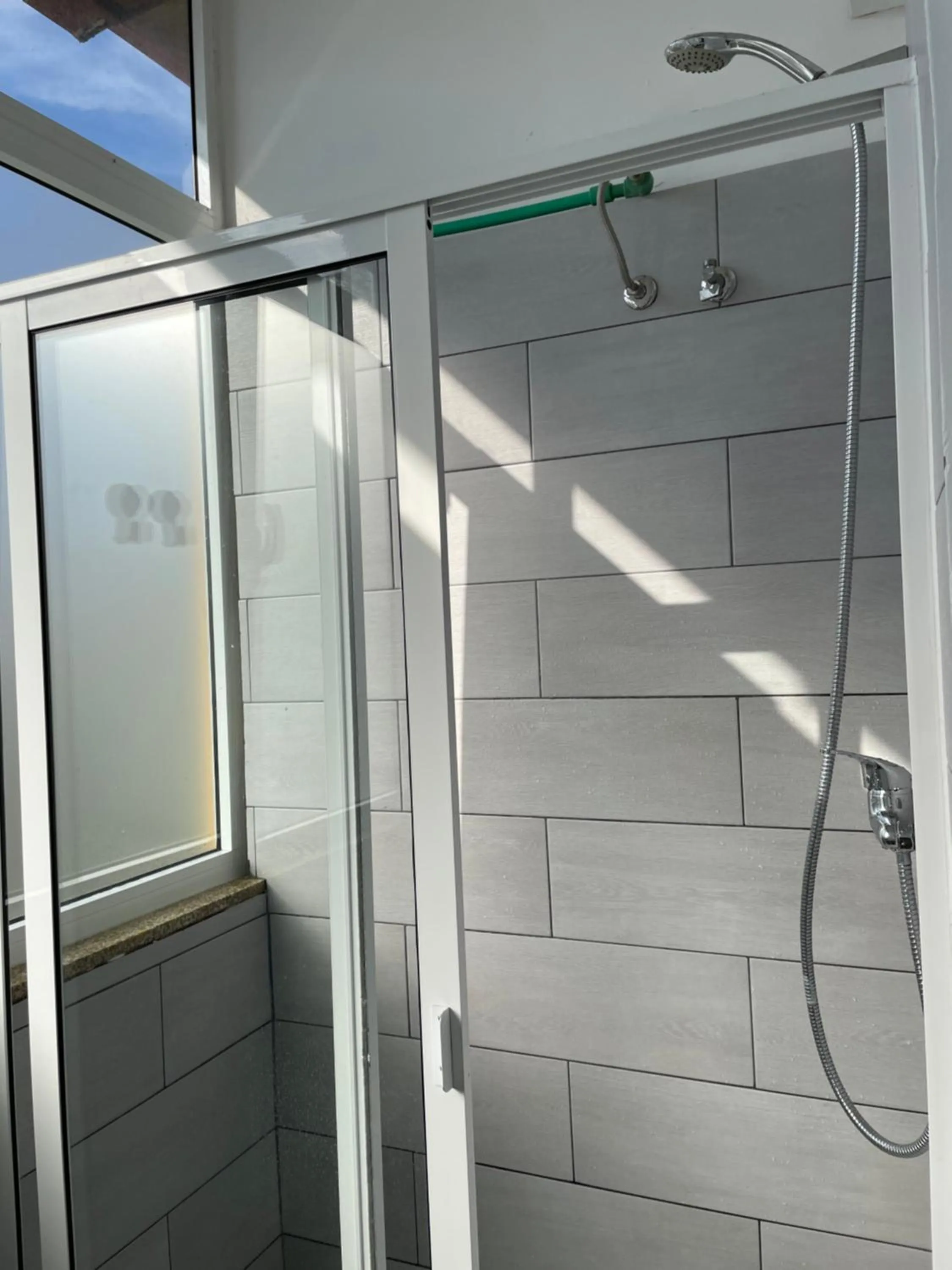 Bathroom in By Doors Hostel