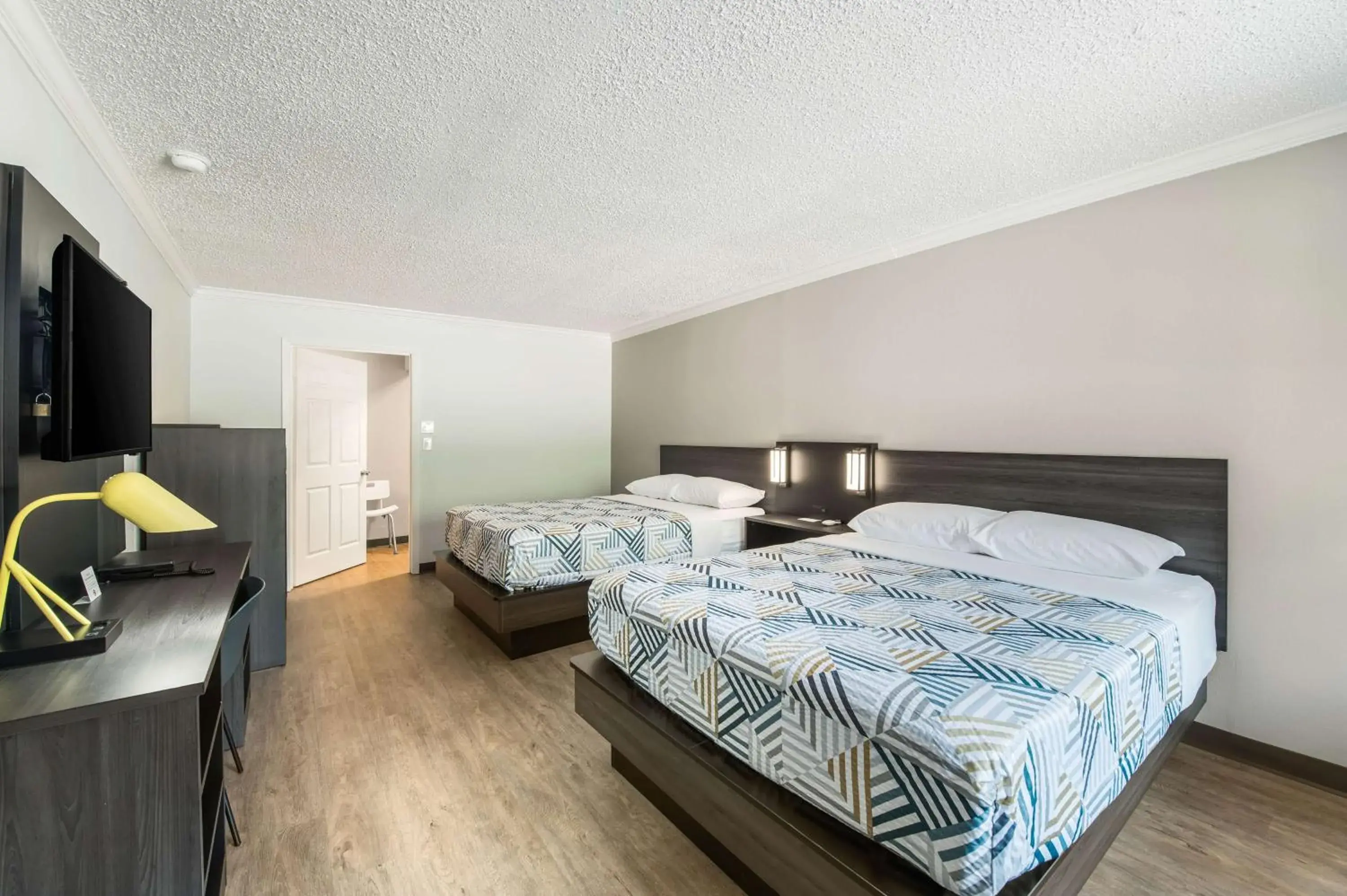 Deluxe Queen Room with Two Queen Beds - Smoking in Motel 6-Kilgore, TX Deluxe Queen Room with Two Queen Beds - Smoking in Motel 6-Kilgore, TX