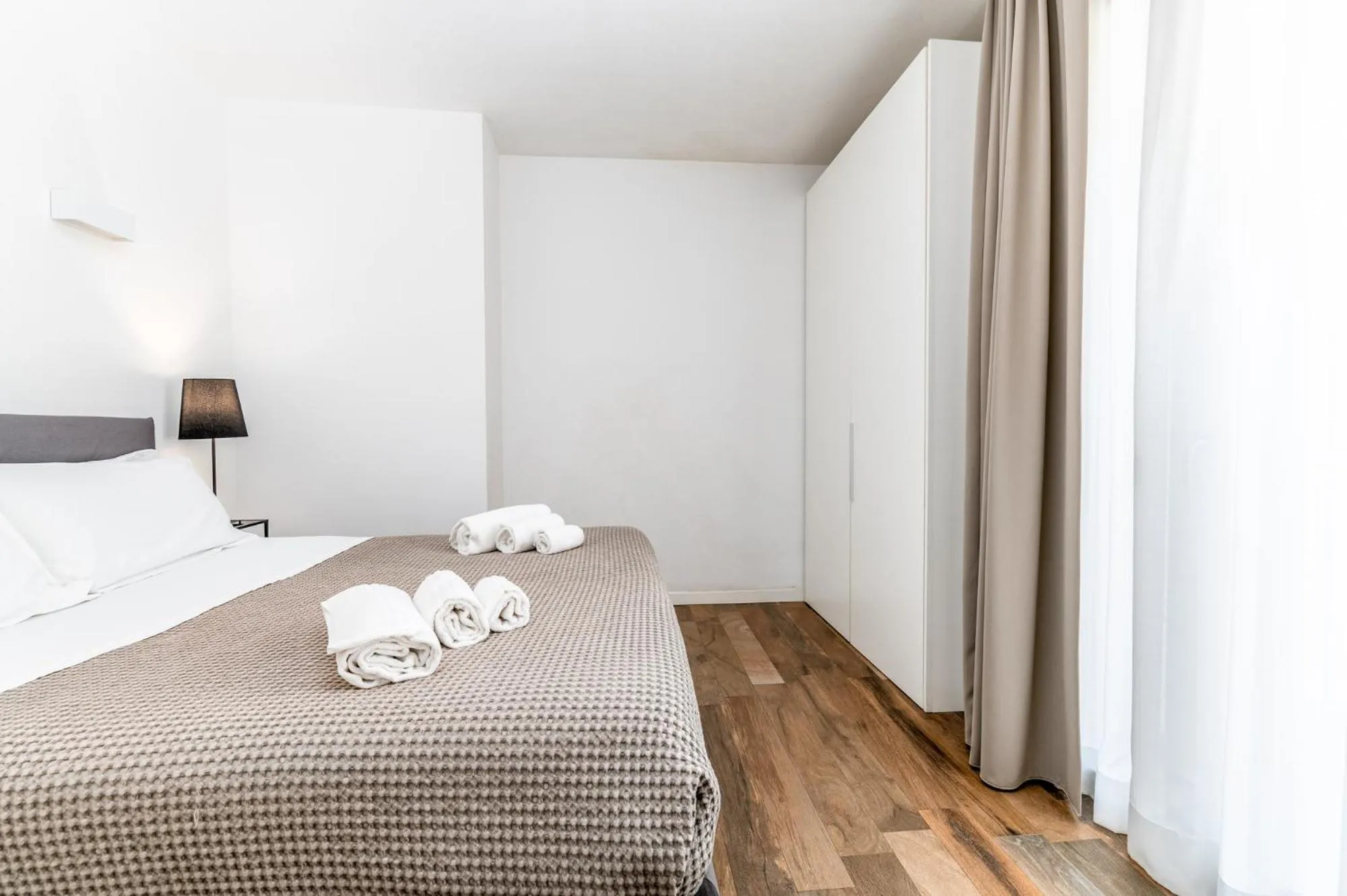 Bed in Santo Stefano Raro Rooms Collection