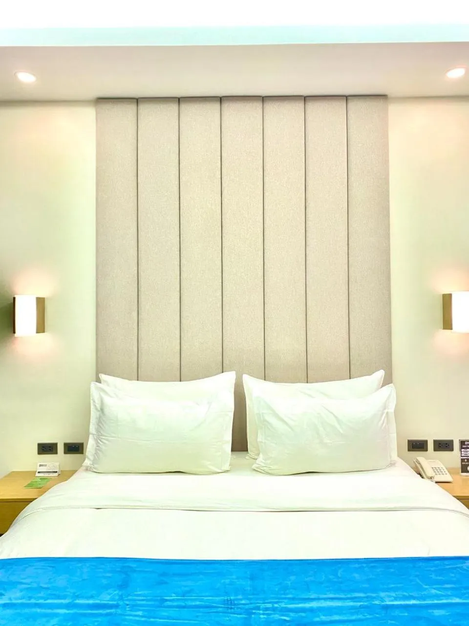 Bed in Bravo Tanauan Hotel