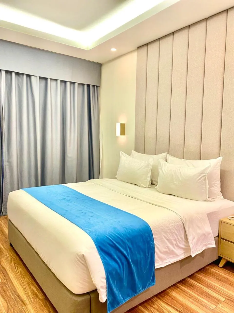 Bed in Bravo Tanauan Hotel