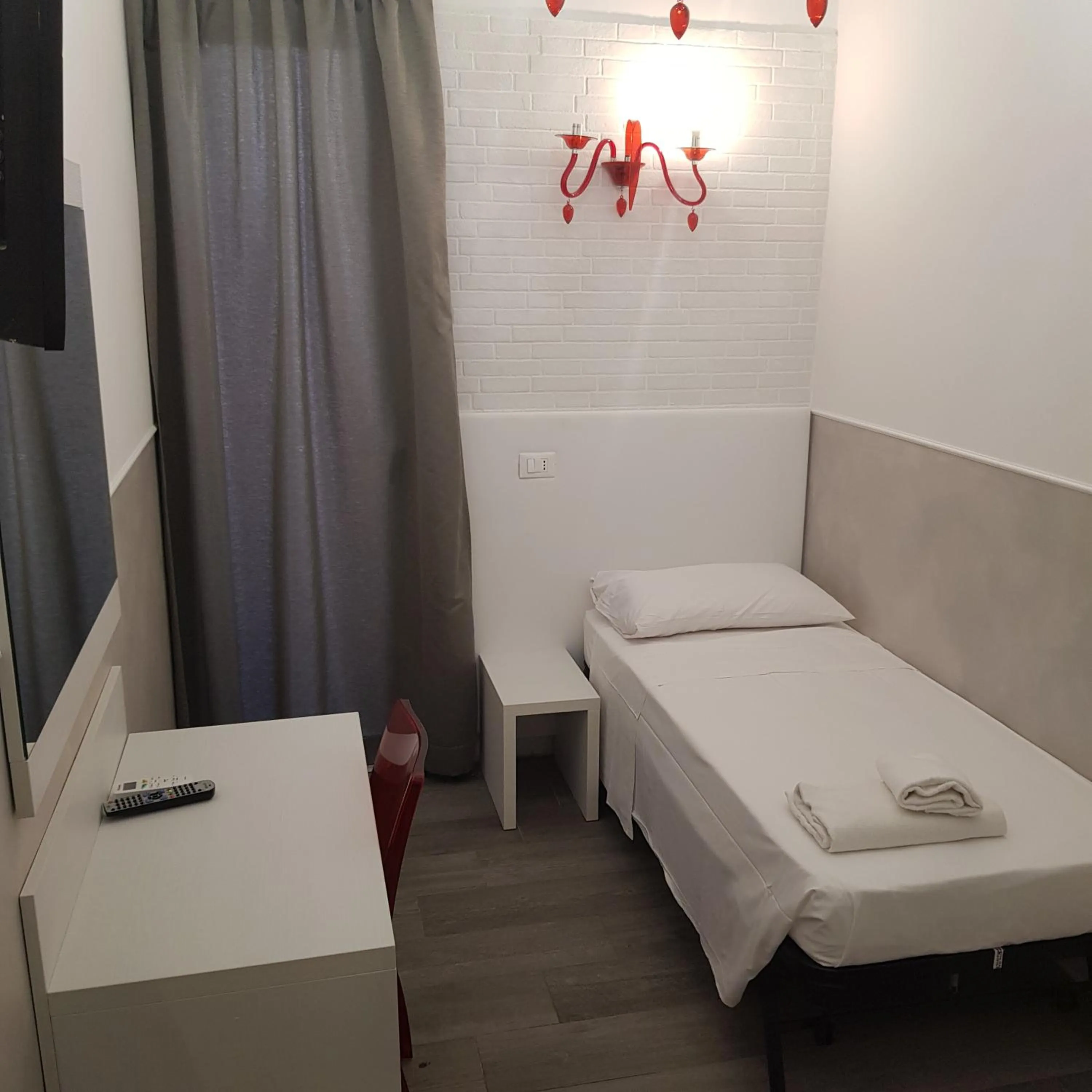 Bed in Rubino Guest House