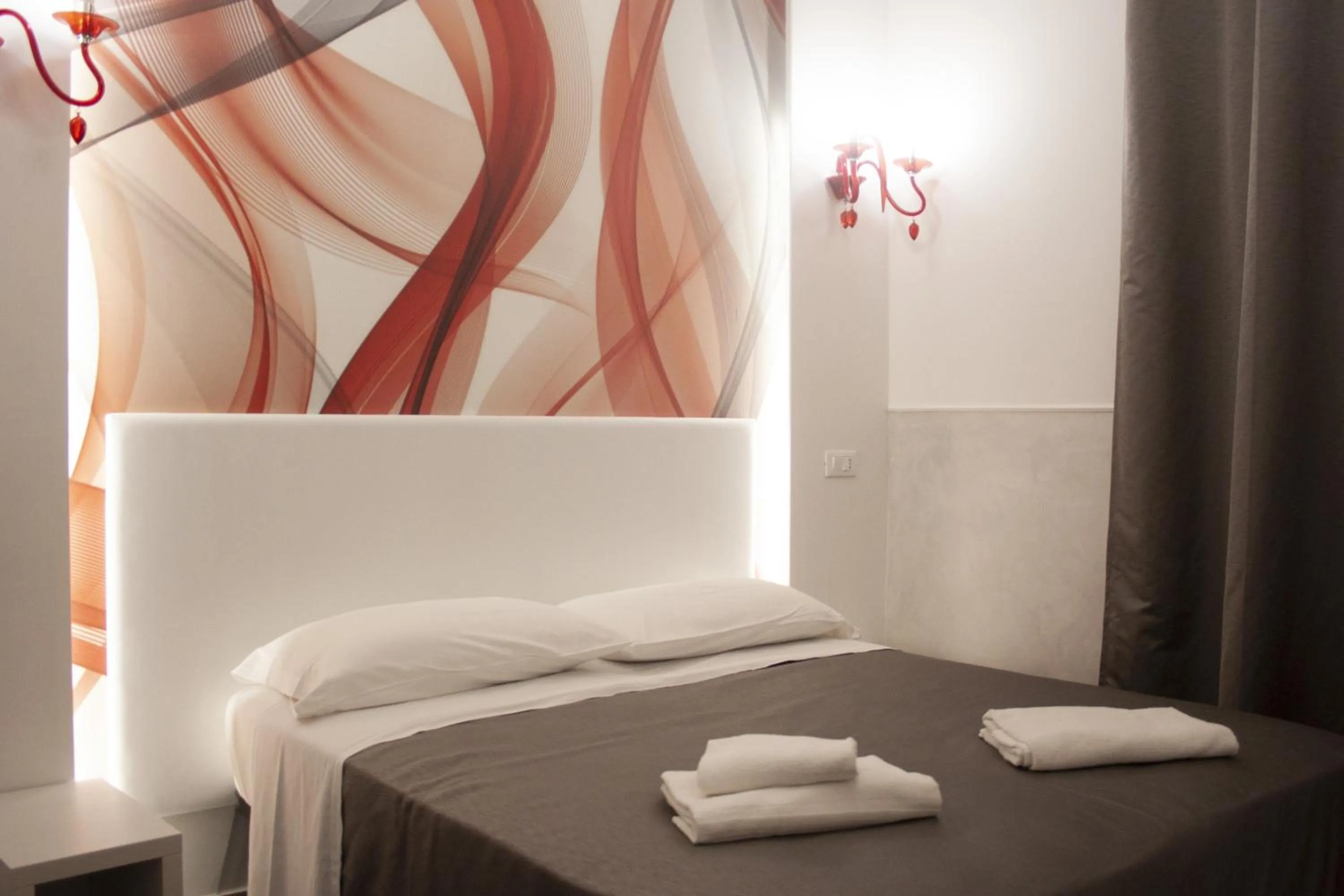 Bed in Rubino Guest House