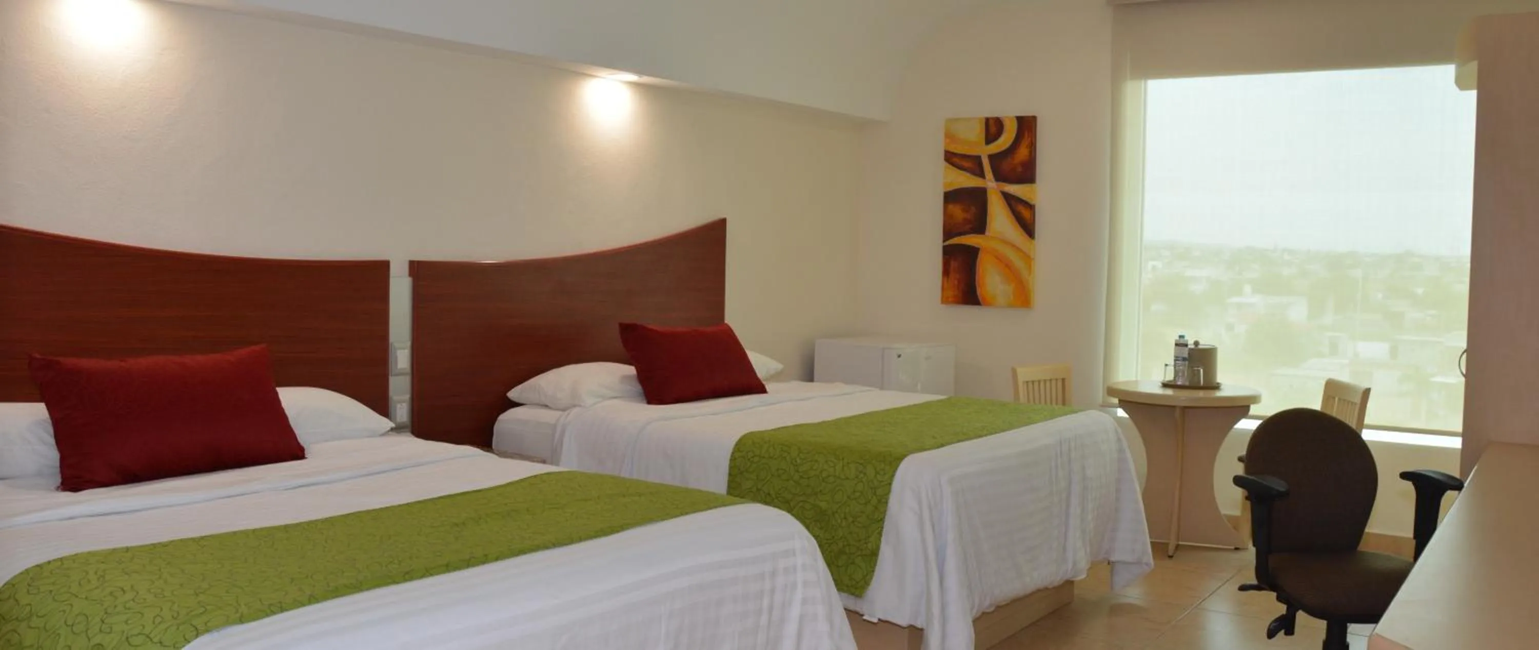 Bed in Hotel Magico Inn