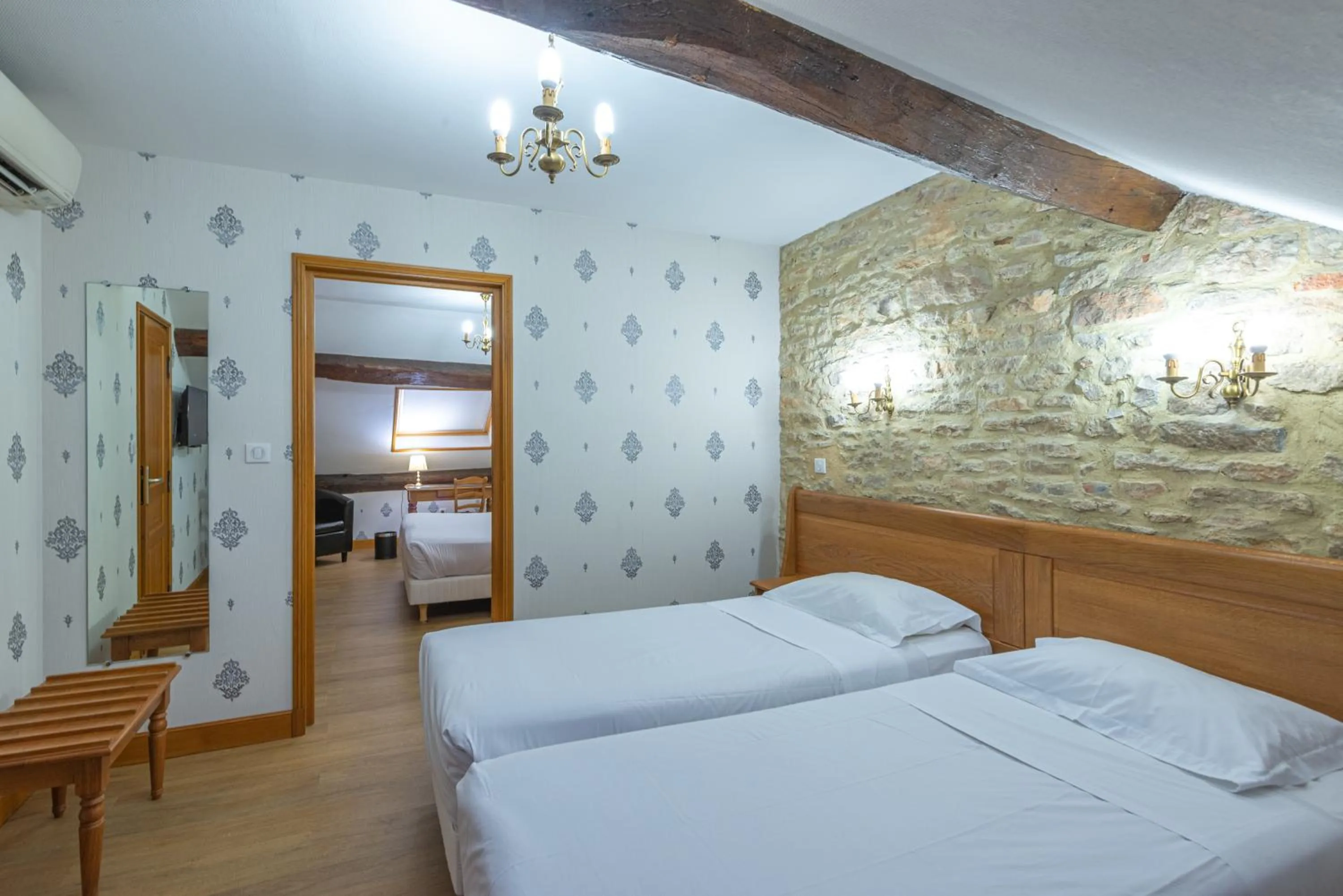 Photo of the whole room, Bed in Logis Hotel de La Cloche
