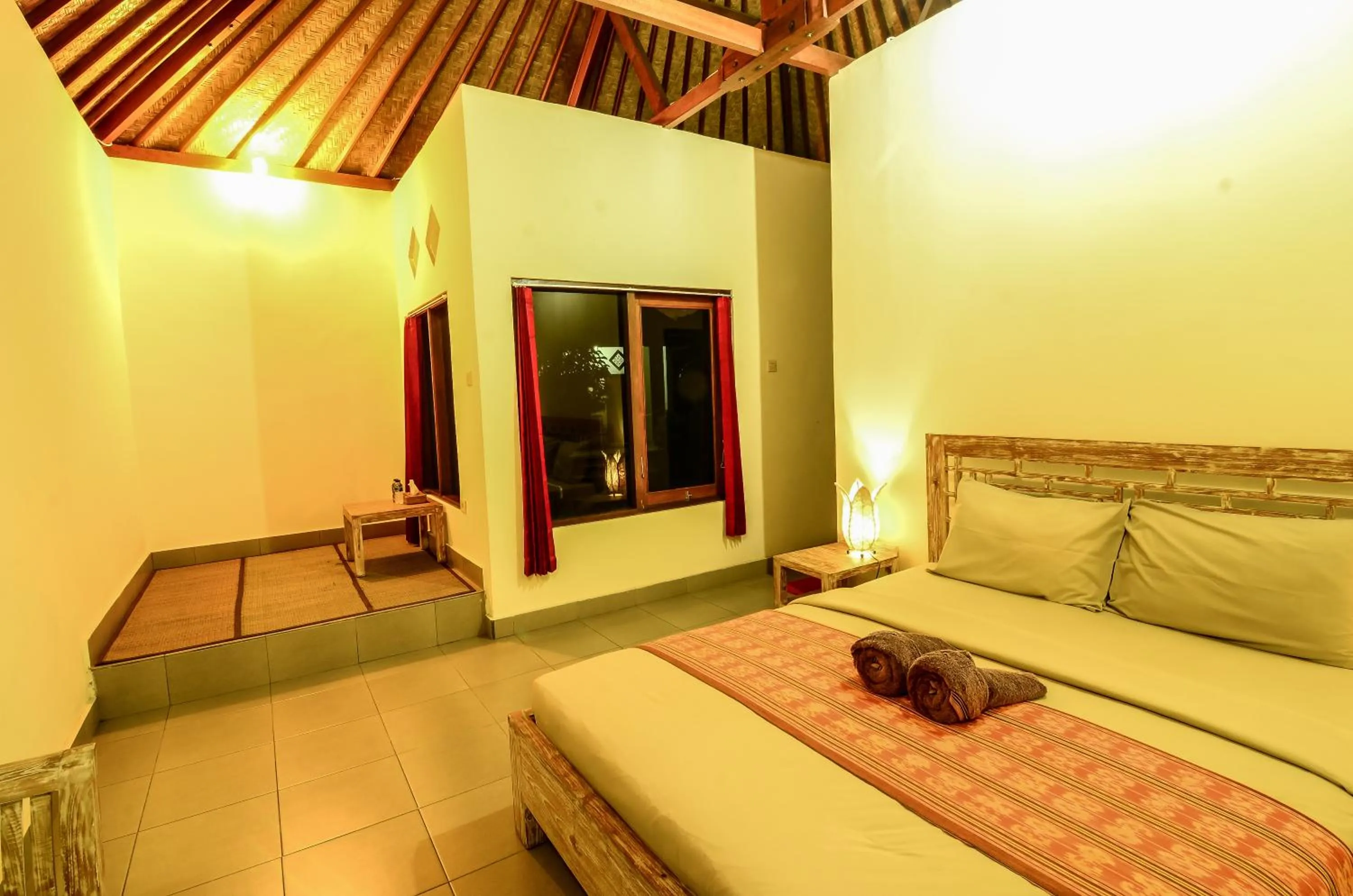 Bed in Mapa Lake View Bungalow